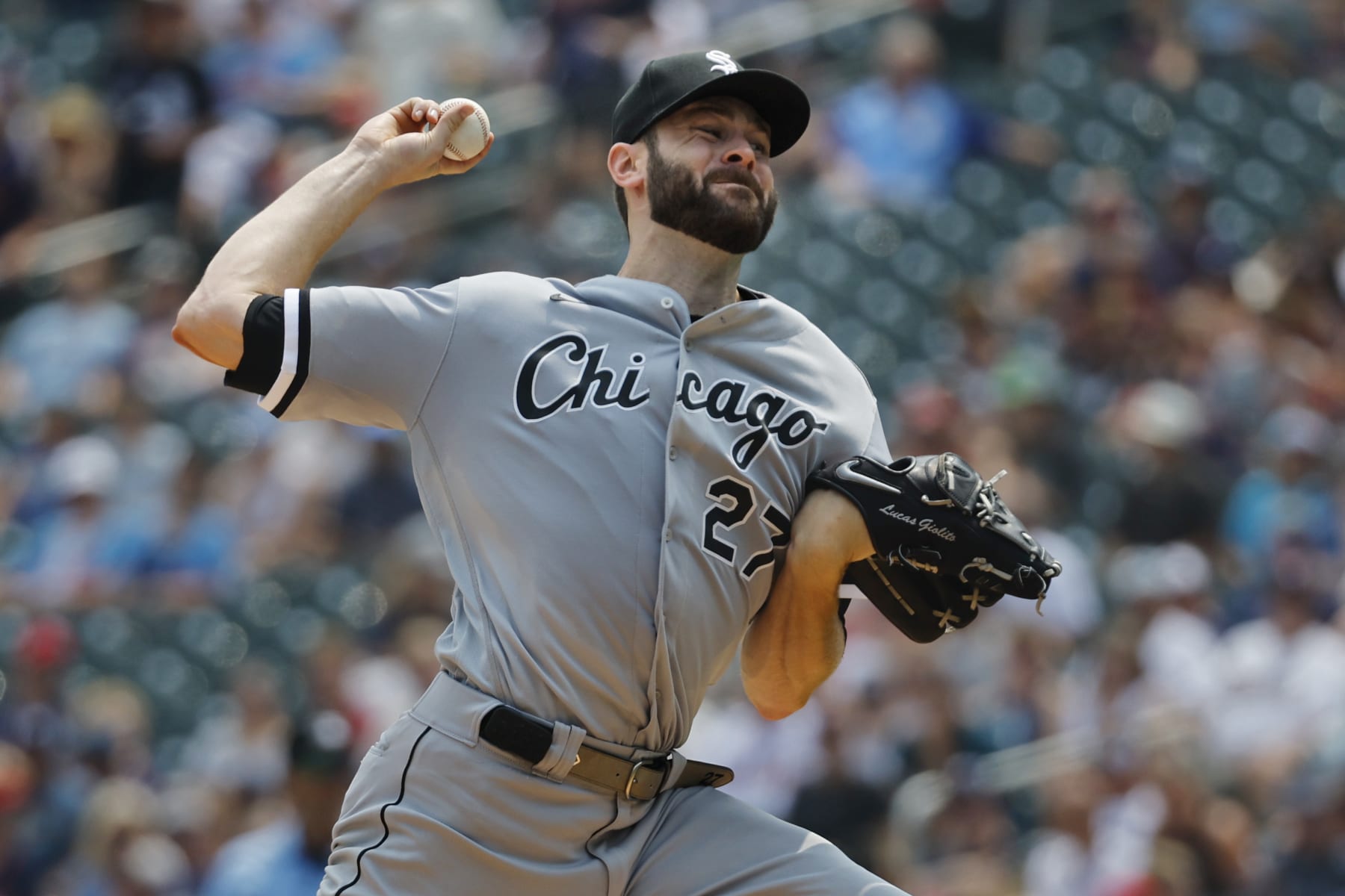 Chicago White Sox starting pitcher Lucas Giolito throws to the Minnesota Twins in the second inning of a baseball game, Sunday, July 23, 2023, in Minneapolis. (AP Photo/Bruce Kluckhohn)