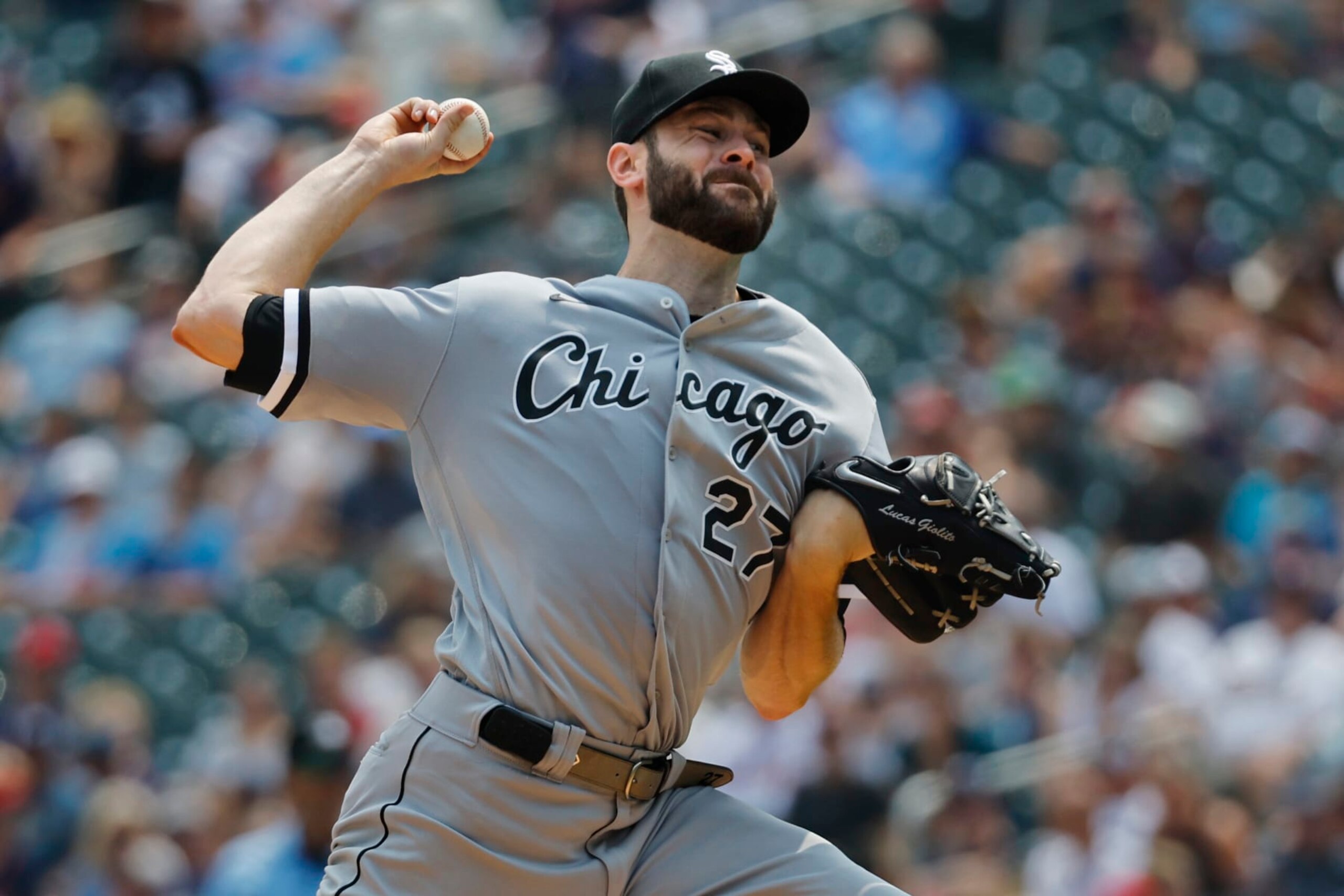Chicago White Sox starting pitcher Lucas Giolito throws to the Minnesota Twins in the second inning of a baseball game, Sunday, July 23, 2023, in Minneapolis. (AP Photo/Bruce Kluckhohn)