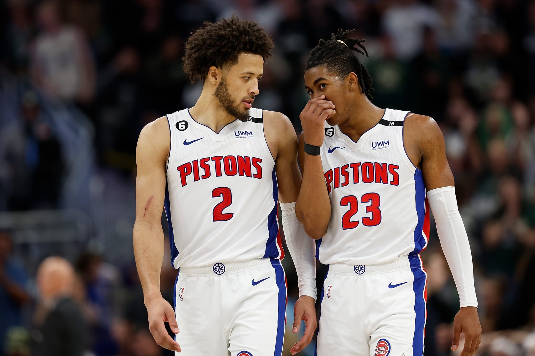 MILWAUKEE, WISCONSIN - OCTOBER 31: Cade Cunningham #2  and Jaden Ivey #23 of the Detroit Pistons talks during a break in the game against the Milwaukee Bucks at Fiserv Forum on October 31, 2022 in Milwaukee, Wisconsin. NOTE TO USER: User expressly acknowledges and agrees that, by downloading and or using this photograph, User is consenting to the terms and conditions of the Getty Images License Agreement. (Photo by John Fisher/Getty Images)