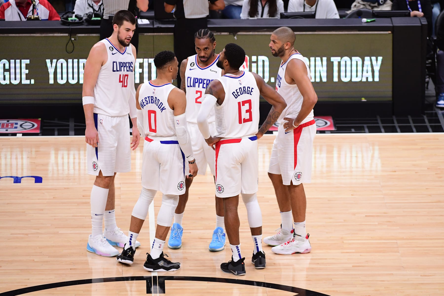 LOS ANGELES, CA - MARCH 5: Russell Westbrook #0, Ivica Zubac #40, Kawhi Leonard #2, Nicolas Batum #33 and Paul George #13 of the LA Clippers huddle up during the game against the Memphis Grizzlies on March 5, 2023 at Crypto.Com Arena in Los Angeles, California. NOTE TO USER: User expressly acknowledges and agrees that, by downloading and/or using this Photograph, user is consenting to the terms and conditions of the Getty Images License Agreement. Mandatory Copyright Notice: Copyright 2023 NBAE (Photo by Adam Pantozzi/NBAE via Getty Images)