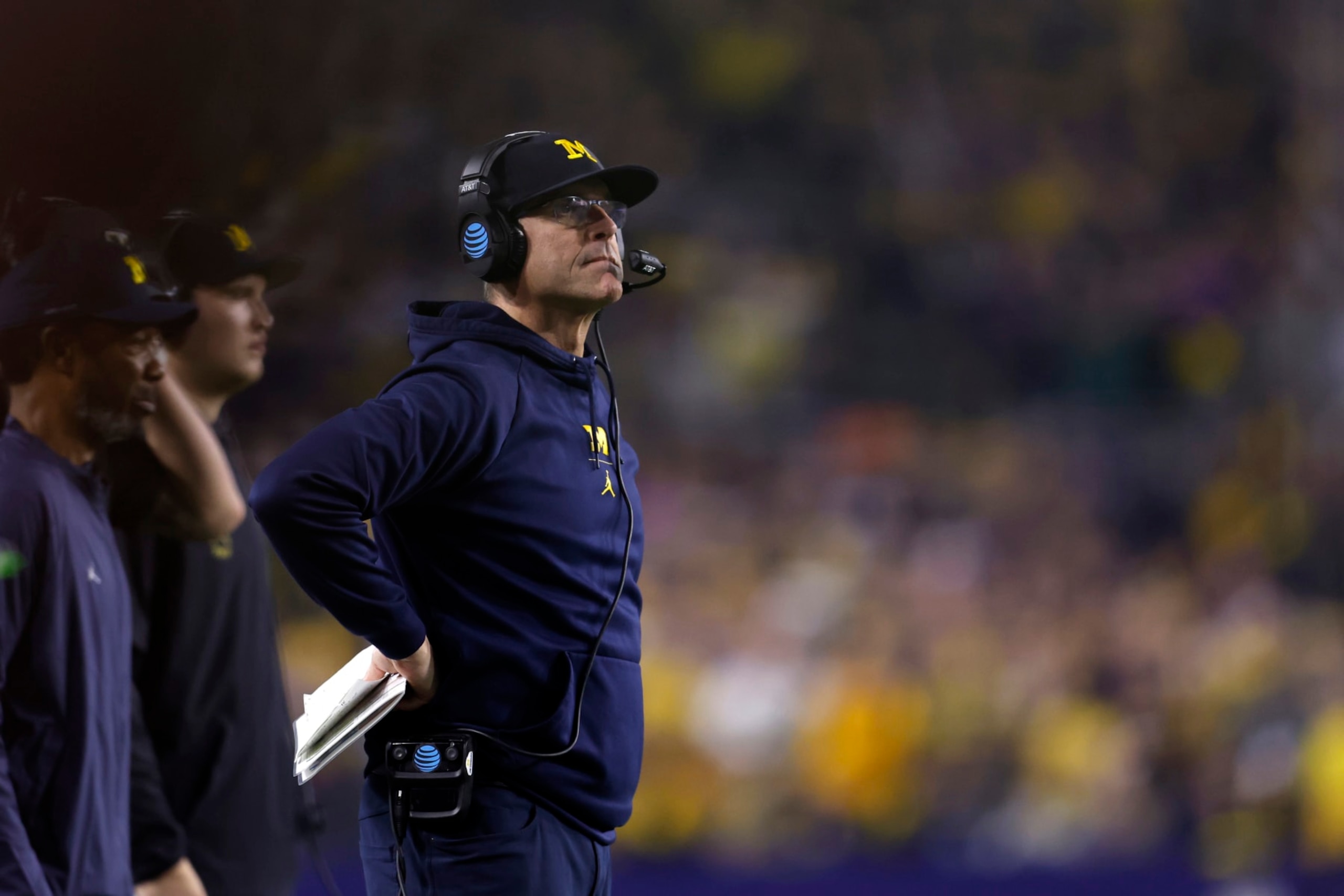 GLENDALE, ARIZONA - DECEMBER 31: Head coach Jim Harbaugh of the Michigan Wolverines looks on during the second half of the Vrbo Fiesta Bowl against the TCU Horned Frogs at State Farm Stadium on December 31, 2022 in Glendale, Arizona. The Horned Frogs defeated the Wolverines 51-45. (Photo by Chris Coduto/Getty Images)