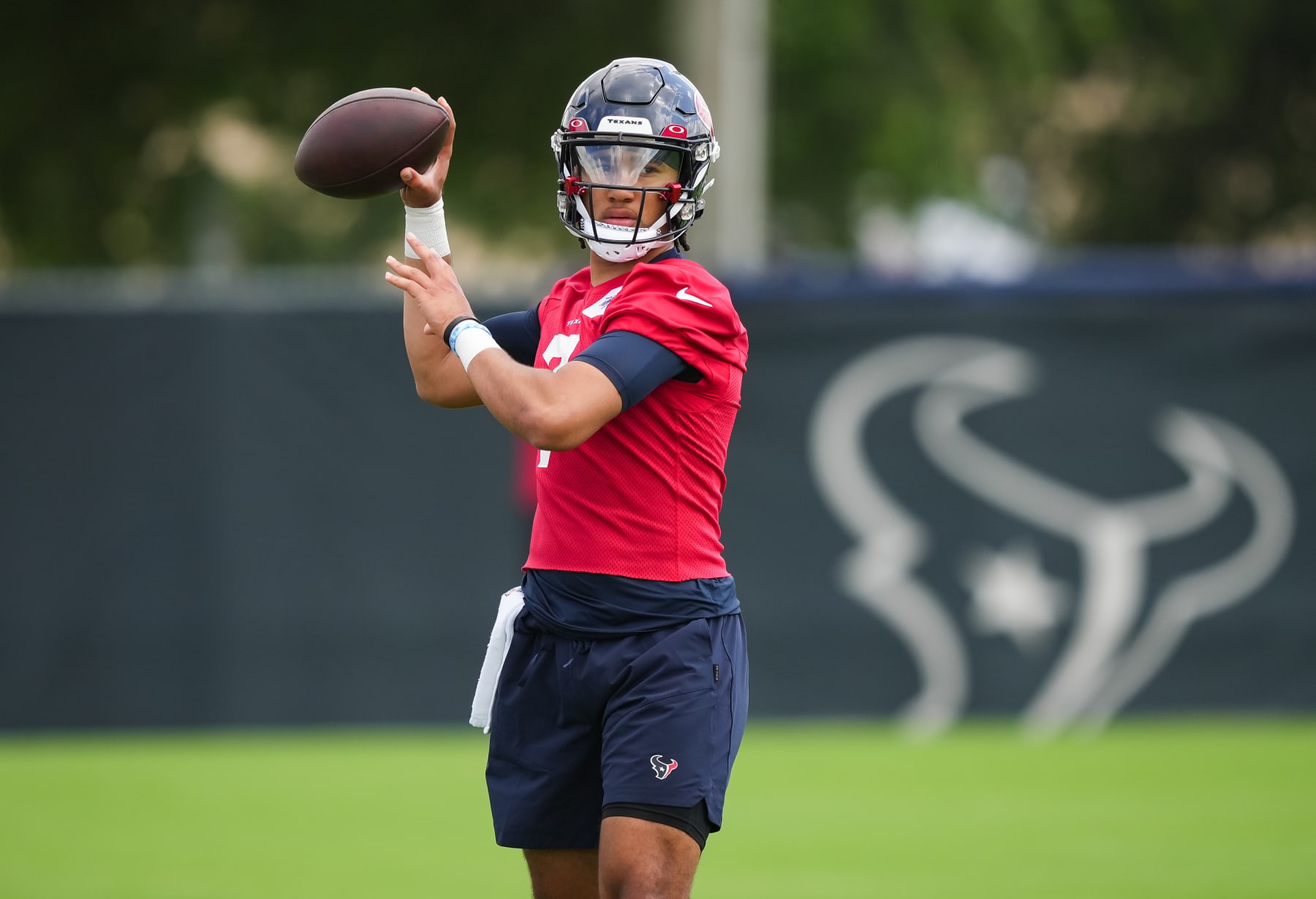 HOUSTON, TEXAS - MAY 12: Quarterback C.J Stroud #7 of the Houston Texans throws during the first day of Houston Texans Rookie Minicamp at NRG Stadium on May 12, 2023 in Houston, Texas. (Photo by Alex Bierens de Haan/Getty Images)