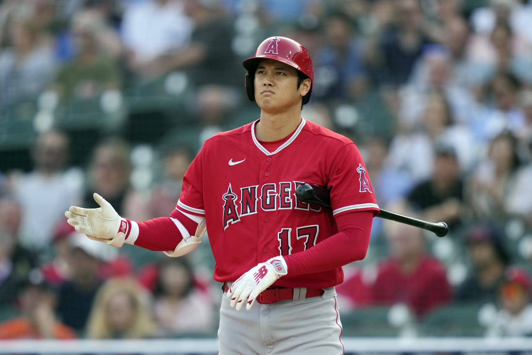 Los Angeles Angels designated hitter Shohei Ohtani reacts after a call strike during the first inning of a baseball game against the Detroit Tigers, Tuesday, July 25, 2023, in Detroit. (AP Photo/Carlos Osorio)