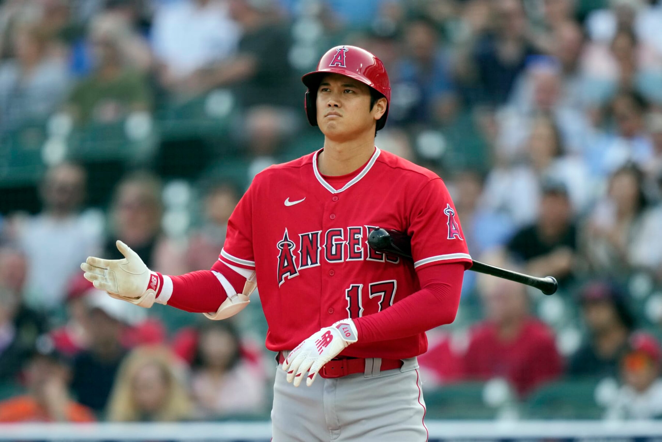 Los Angeles Angels designated hitter Shohei Ohtani reacts after a call strike during the first inning of a baseball game against the Detroit Tigers, Tuesday, July 25, 2023, in Detroit. (AP Photo/Carlos Osorio)