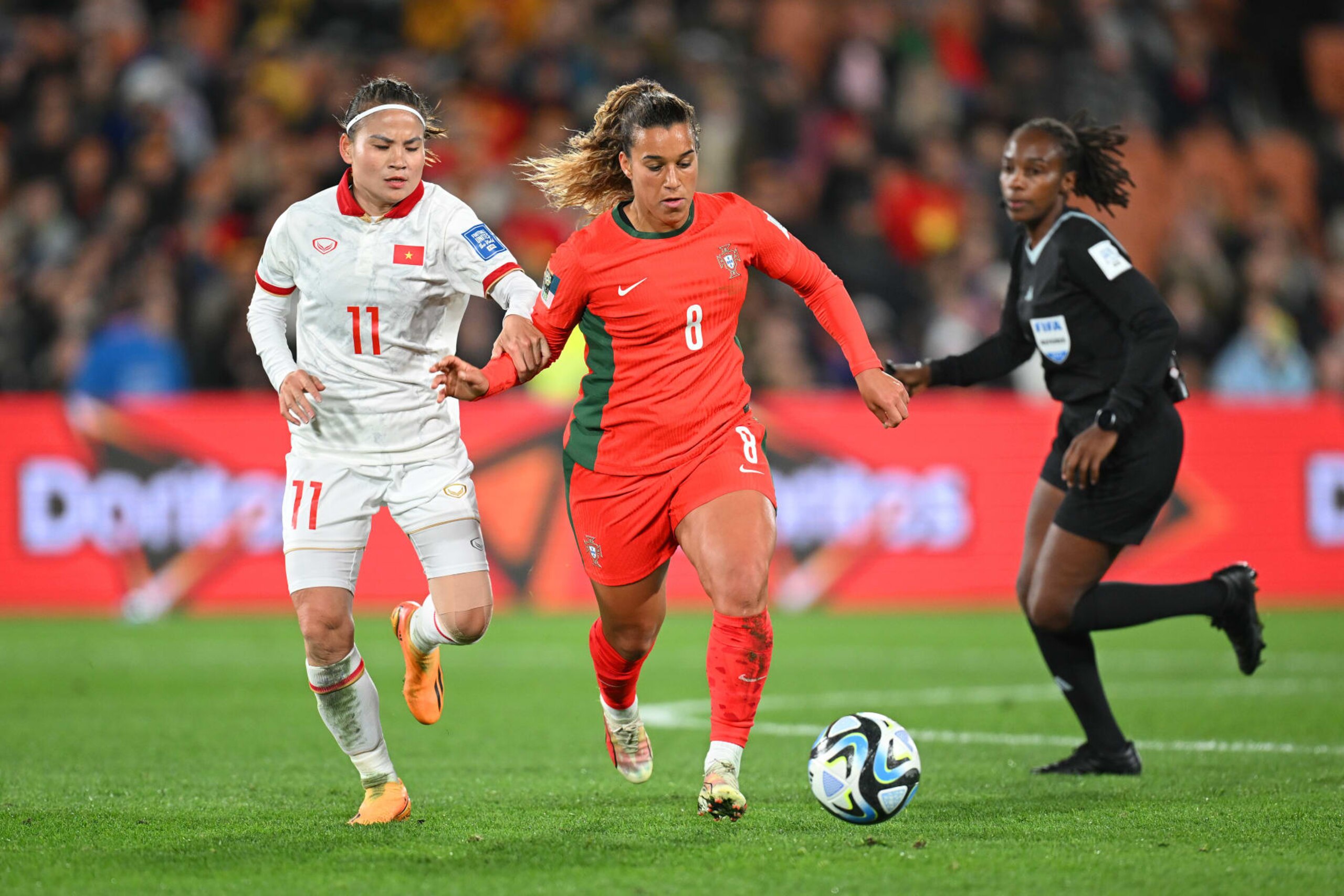 HAMILTON, NEW ZEALAND - JULY 27: Andreia Norton of Portugal  controls the ball against Thai Thi Thao of Vietnam during the FIFA Women's World Cup Australia & New Zealand 2023 Group E match between Portugal and Vietnam at Waikato Stadium on July 27, 2023 in Hamilton / Kirikiriroa, New Zealand. (Photo by Hannah Peters - FIFA/FIFA via Getty Images)