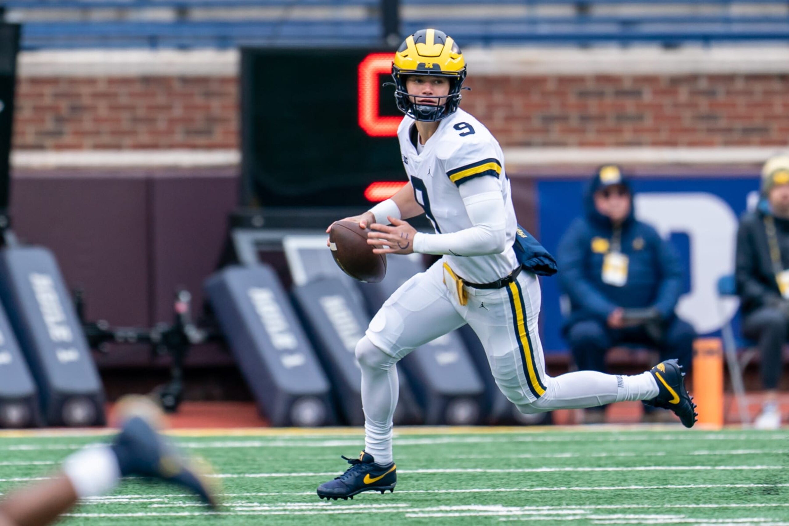 ANN ARBOR, MI - APRIL 01:  JJ McCarthy #9 of the Maize Team looks to pass against the Blue Team during the first quarter of the Michigan Spring football game at Michigan Stadium on April 1, 2023 in Ann Arbor, Michigan. (Photo by Jaime Crawford/Getty Images)