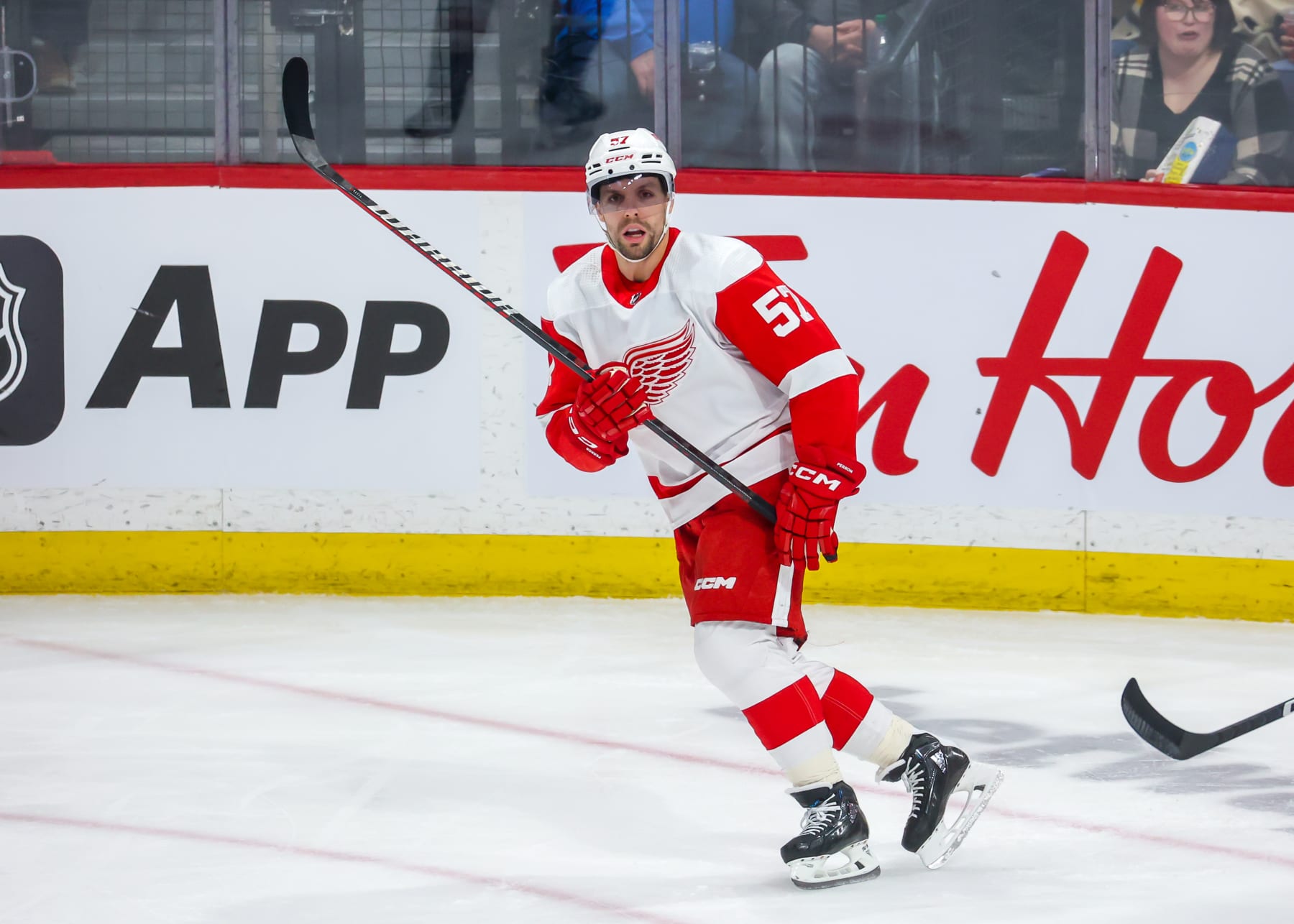 WINNIPEG, CANADA - MARCH 31: David Perron #57 of the Detroit Red Wings skates during third period action against the Winnipeg Jets at Canada Life Centre on March 31, 2023 in Winnipeg, Manitoba, Canada. (Photo by Jonathan Kozub/NHLI via Getty Images)