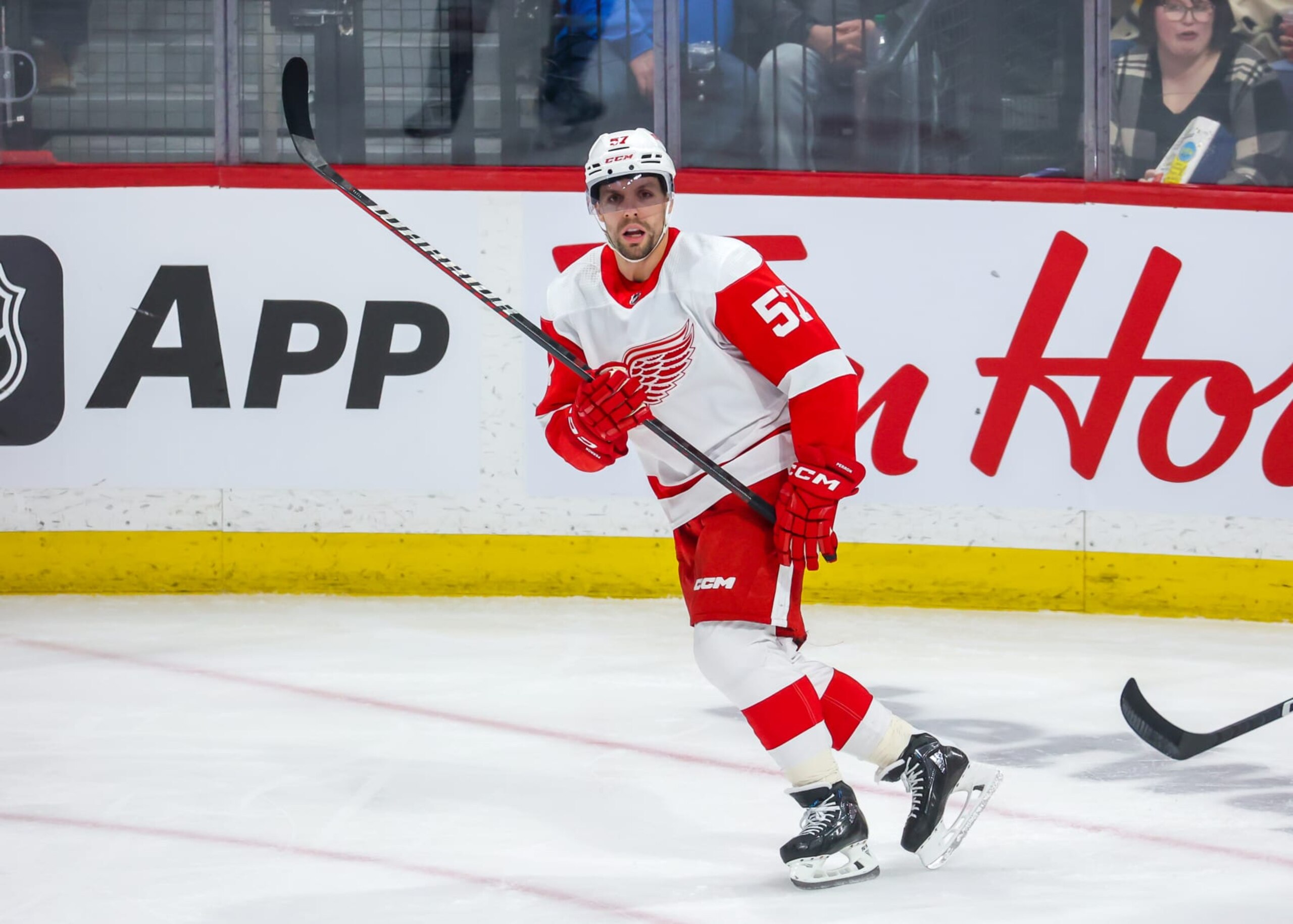 WINNIPEG, CANADA - MARCH 31: David Perron #57 of the Detroit Red Wings skates during third period action against the Winnipeg Jets at Canada Life Centre on March 31, 2023 in Winnipeg, Manitoba, Canada. (Photo by Jonathan Kozub/NHLI via Getty Images)