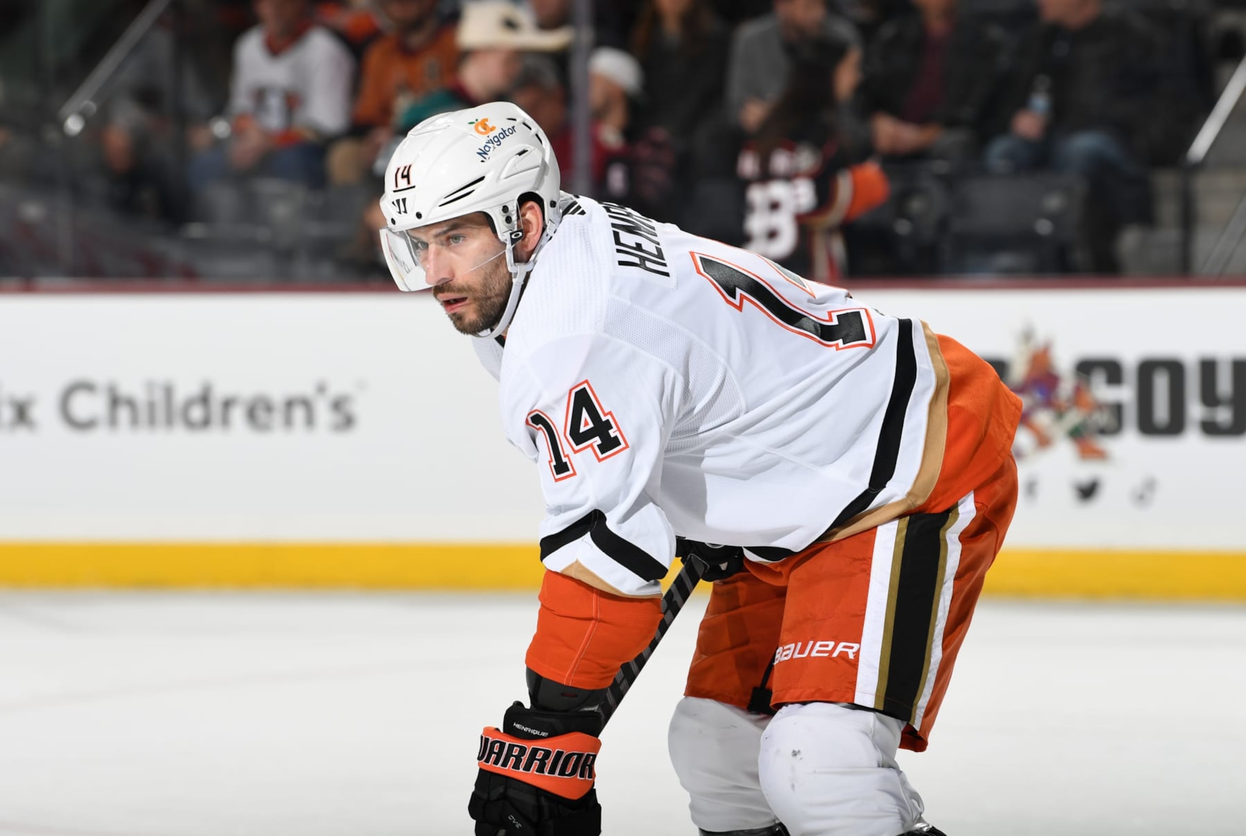 TEMPE, ARIZONA - JANUARY 24: Adam Henrique #14 of the Anaheim Ducks gets ready during a face off against the Arizona Coyotes at Mullett Arena on January 24, 2023 in Tempe, Arizona. (Photo by Norm Hall/NHLI via Getty Images)