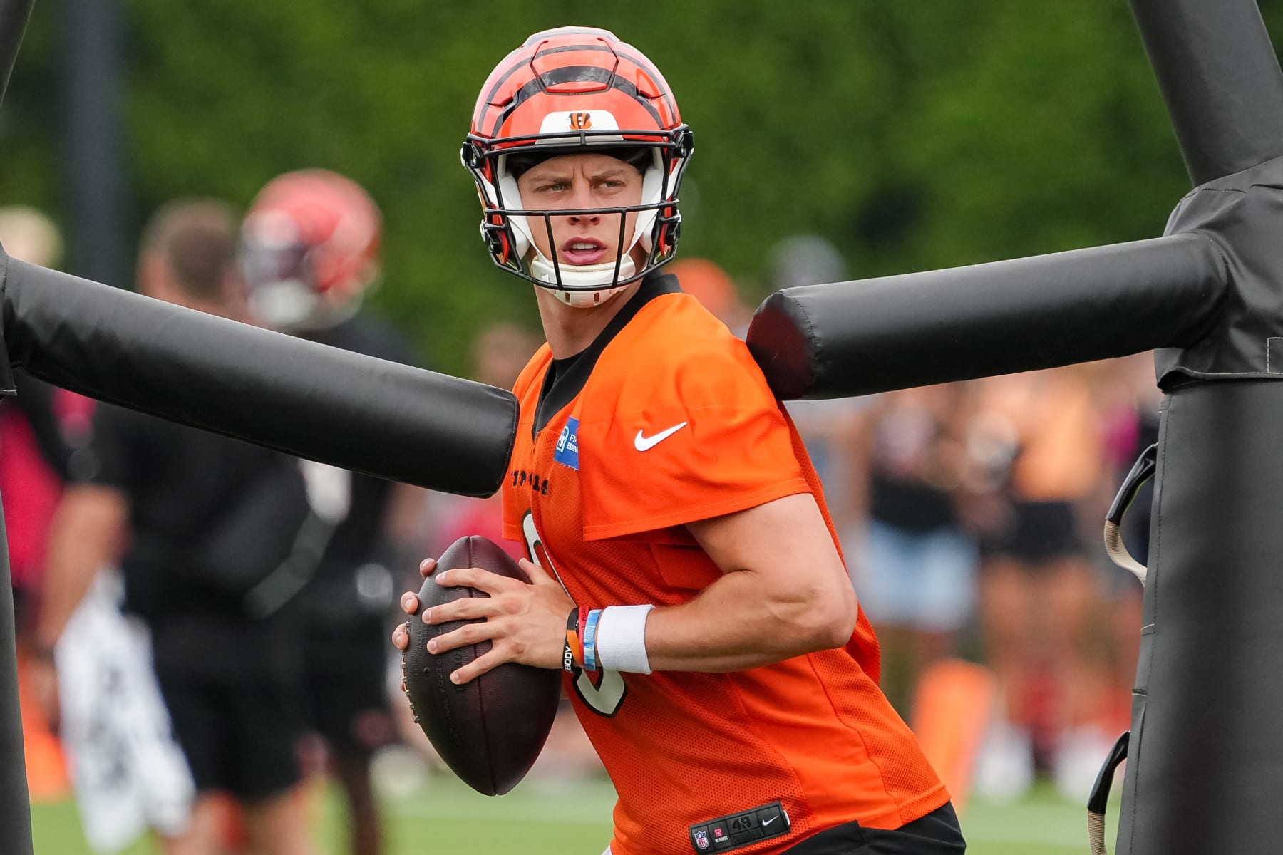 CINCINNATI, OHIO - JULY 26: Joe Burrow #9 of the Cincinnati Bengals participates in a drill during training camp at Kettering Health Practice Fields on July 26, 2023 in Cincinnati, Ohio. (Photo by Dylan Buell/Getty Images)