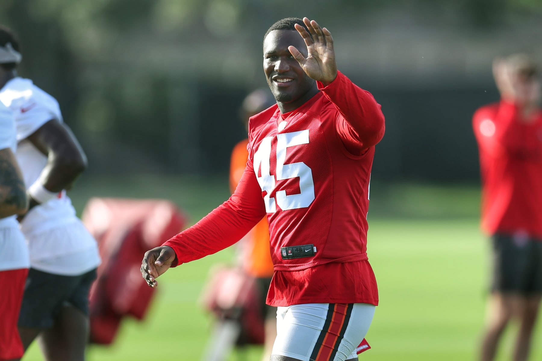 TAMPA, FL - JUL 26: Tampa Bay Buccaneers Linebacker Devin White (45) waves at the media during the Tampa Bay Buccaneers Training Camp on July 26, 2023 at the AdventHealth Training Center at One Buccaneer Place in Tampa, Florida. (Photo by Cliff Welch/Icon Sportswire via Getty Images)