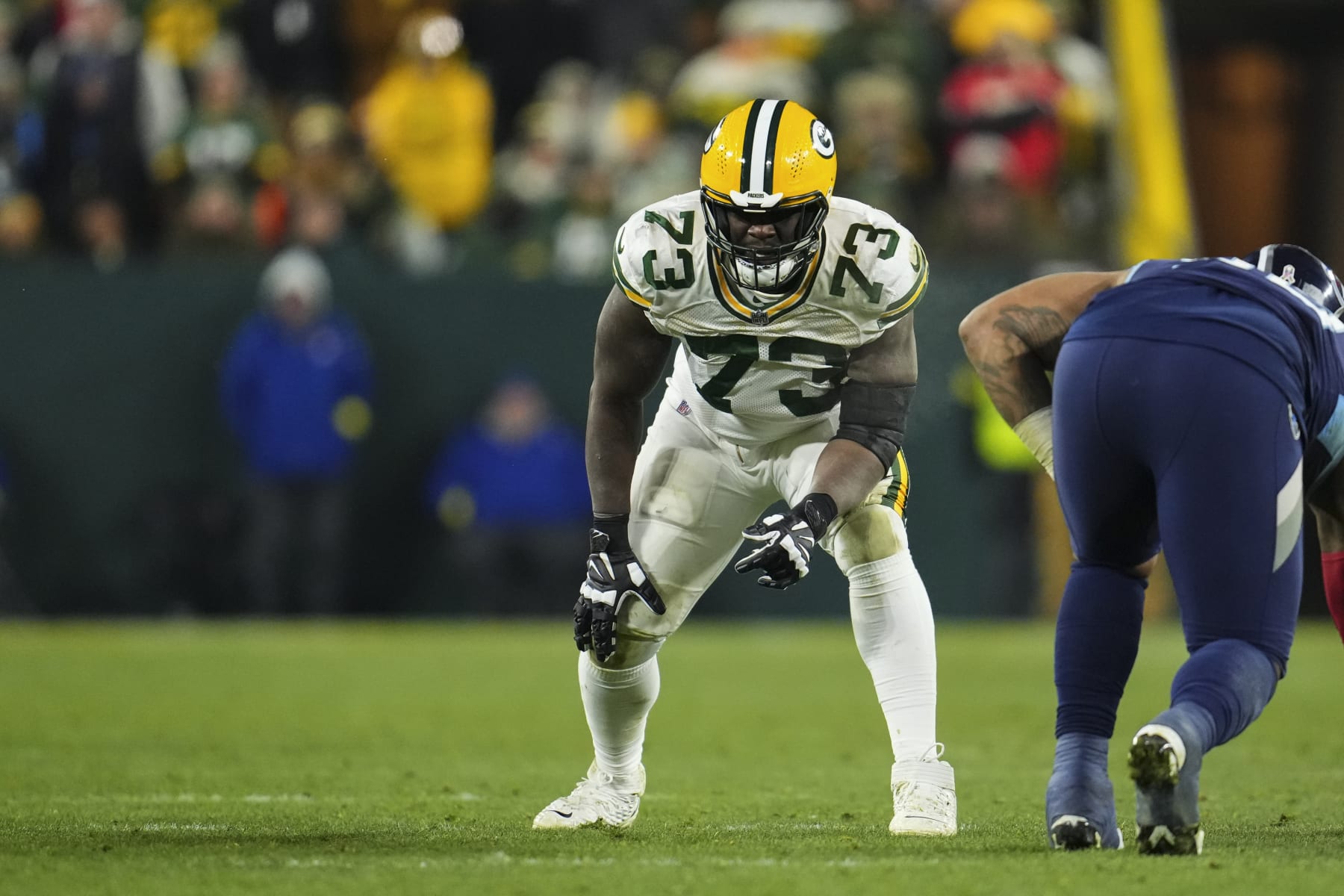 GREEN BAY, WI - NOVEMBER 17: Yosh Nijman #73 of the Green Bay Packers gets set against the Tennessee Titans at Lambeau on November 17, 2022 in Green Bay, Wisconsin. (Photo by Cooper Neill/Getty Images)