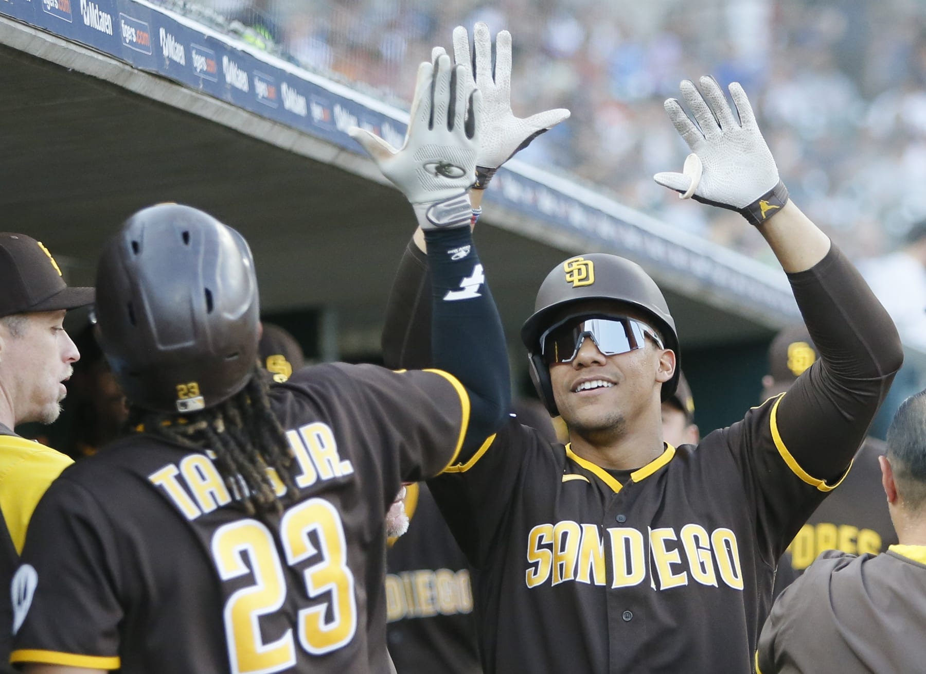 DETROIT, MI - JULY 21: Juan Soto #22 of the San Diego Padres celebrates with Fernando Tatis Jr. #23 after hitting a two-run home run that drove in the pair against the Detroit Tigers during the third inning at Comerica Park on July 21, 2023 in Detroit, Michigan. (Photo by Duane Burleson/Getty Images)
