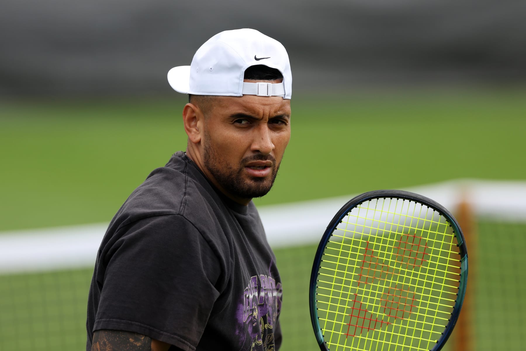 LONDON, ENGLAND - JULY 02: Nick Kyrgios of Australia looks on during a practice session ahead of The Championships - Wimbledon 2023 at All England Lawn Tennis and Croquet Club on July 02, 2023 in London, England. (Photo by Patrick Smith/Getty Images)