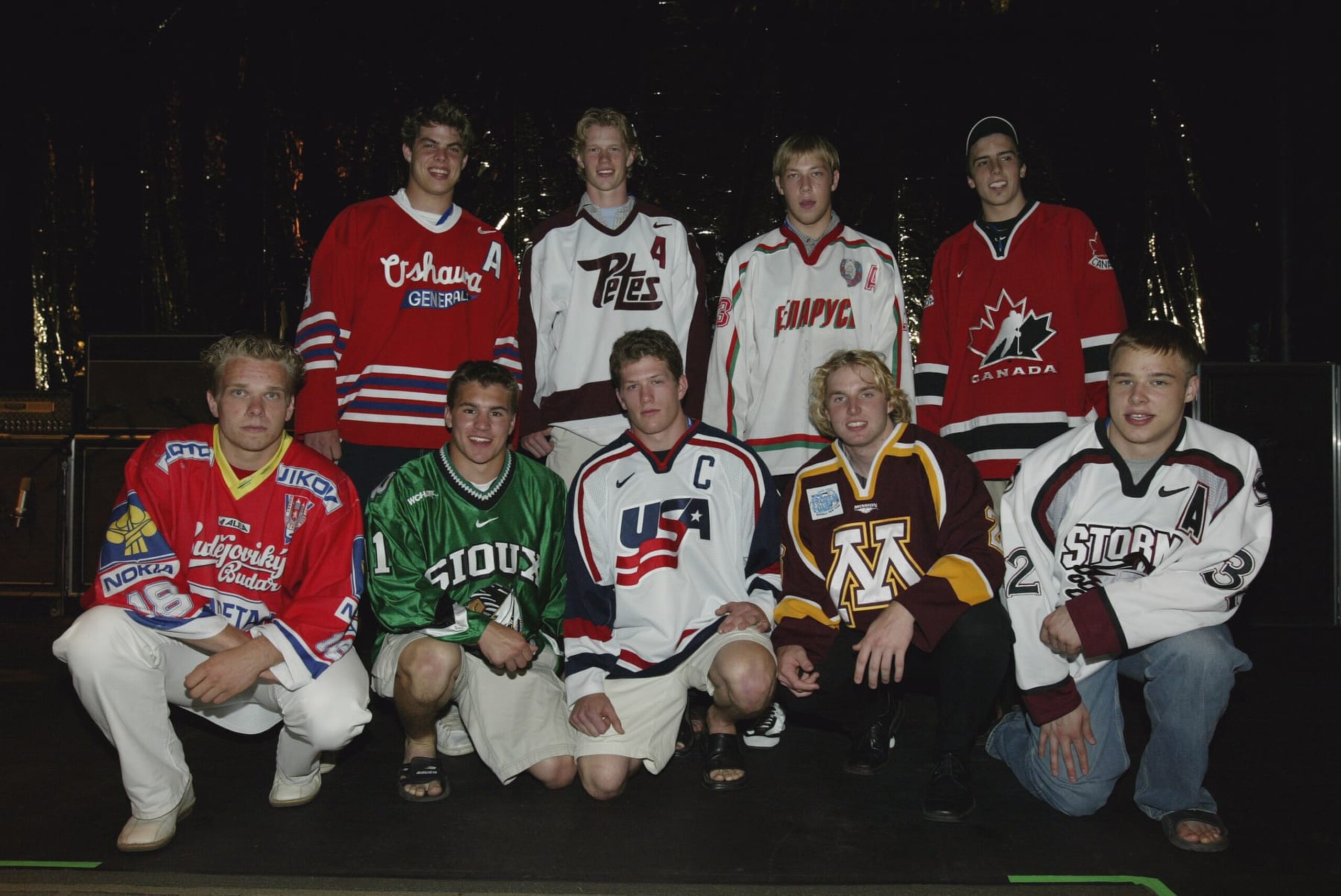 NASHVILLE, TN - JUNE 19: Top NHL Draft prospects pose for a picture on stage in between concerts on June 19, 2003 at the Gaylord Entertainment Center in Nashville, Tennessee.  Front row (L-R) Milan Michalek, Zach Parise, Ryan Suter, Thomas Vanek and Dustin Brown. Back row (L-R) Nathan Horton, Eric Staal, Andrei Kastsitsyn and Marck-Andre Fleury.  (Photo by Elsa/Getty Images/NHLI)