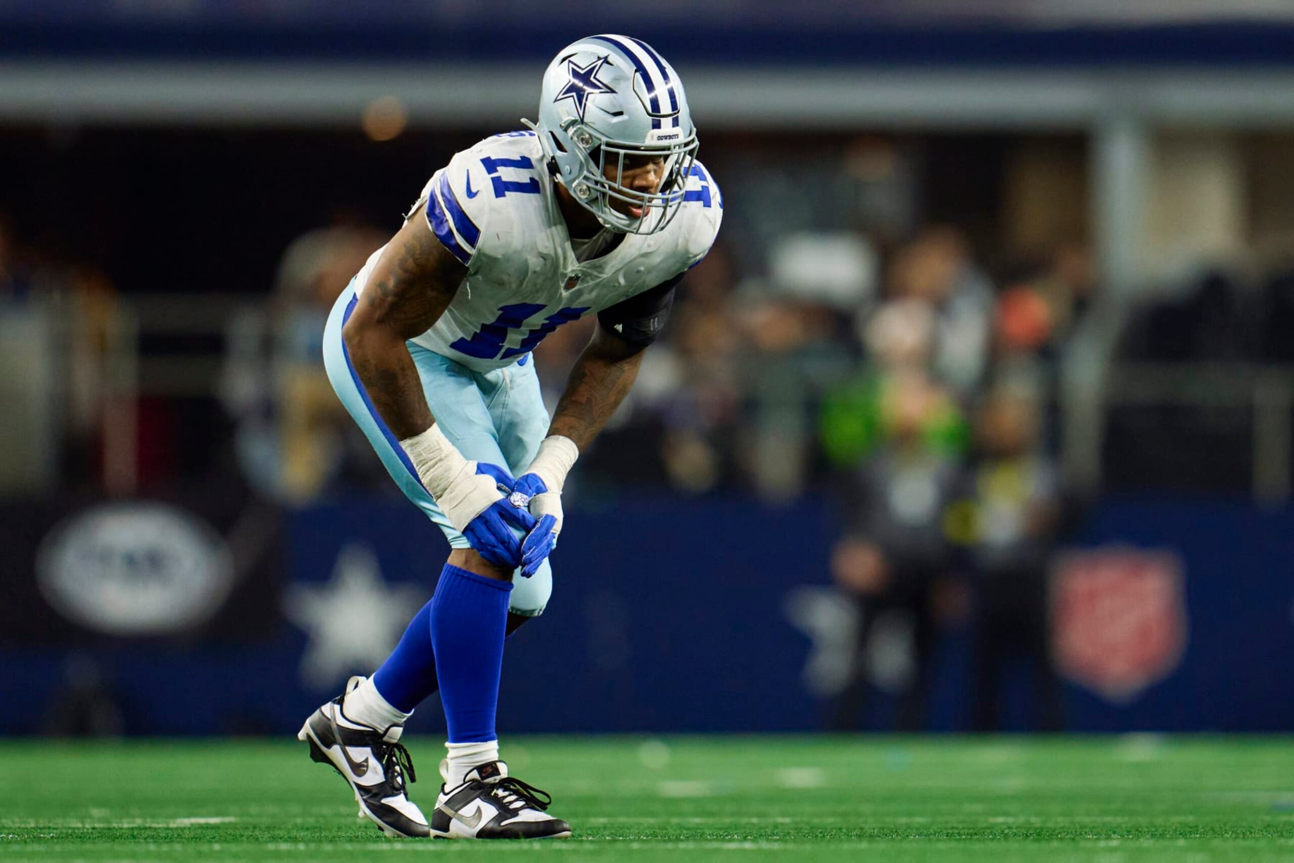 ARLINGTON, TX - DECEMBER 24: Linebacker Micah Parsons #11 of the Dallas Cowboys defends against the Philadelphia Eagles during the second half at AT&T Stadium on December 24, 2022 in Arlington, Texas. (Photo by Cooper Neill/Getty Images)