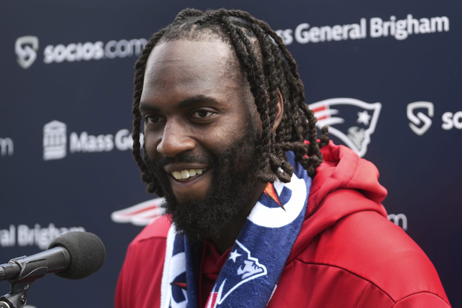 New England Patriots linebacker Matthew Judon speaks with reporters following an NFL football practice, Tuesday, June 13, 2023, in Foxborough, Mass. (AP Photo/Steven Senne)