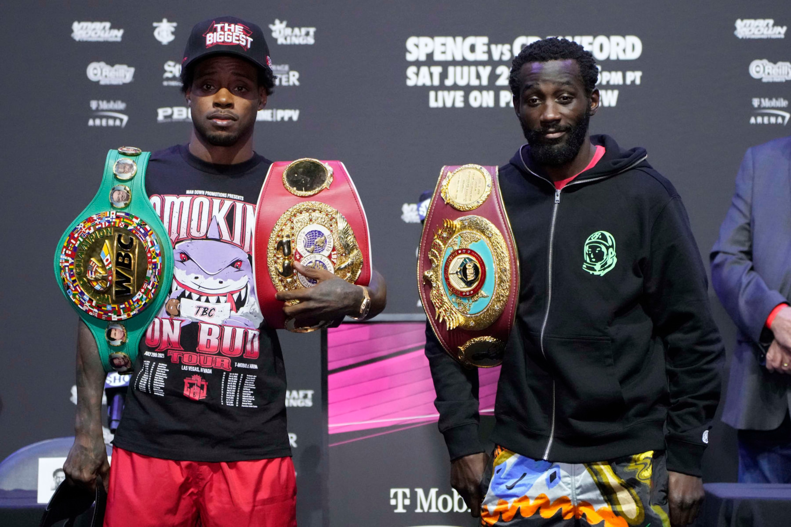 Errol Spence Jr., left, and Terence Crawford pose during a news conference Thursday, July 27, 2023, in Las Vegas. The two are scheduled to fight in an undisputed welterweight championship boxing match Saturday in Las Vegas. (AP Photo/John Locher)