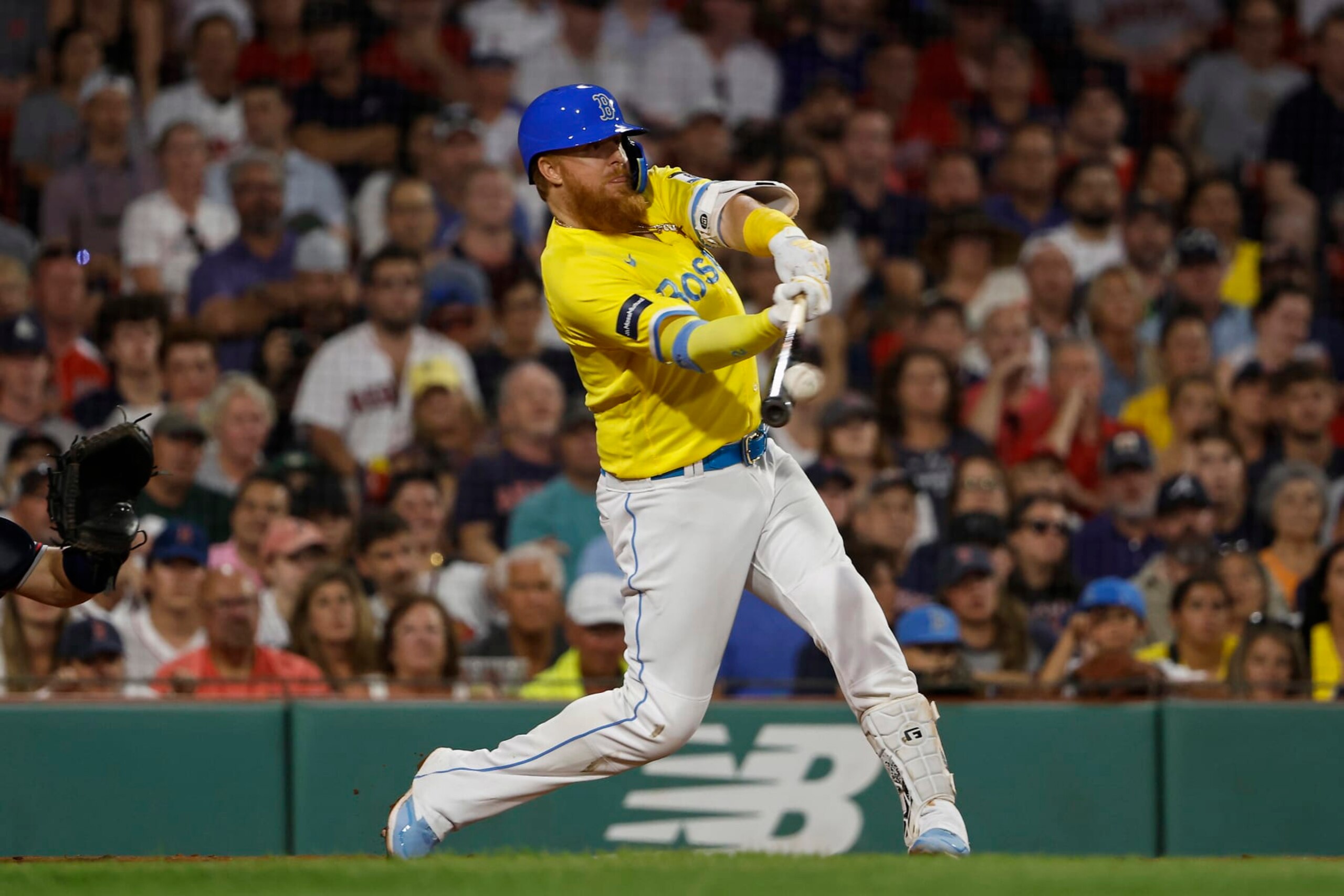 BOSTON, MA - JULY 26: Justin Turner #2 of the Boston Red Sox connects on a two-run double against the Atlanta Braves during the seventh inning at Fenway Park on July 26, 2023 in Boston, Massachusetts. (Photo By Winslow Townson/Getty Images)