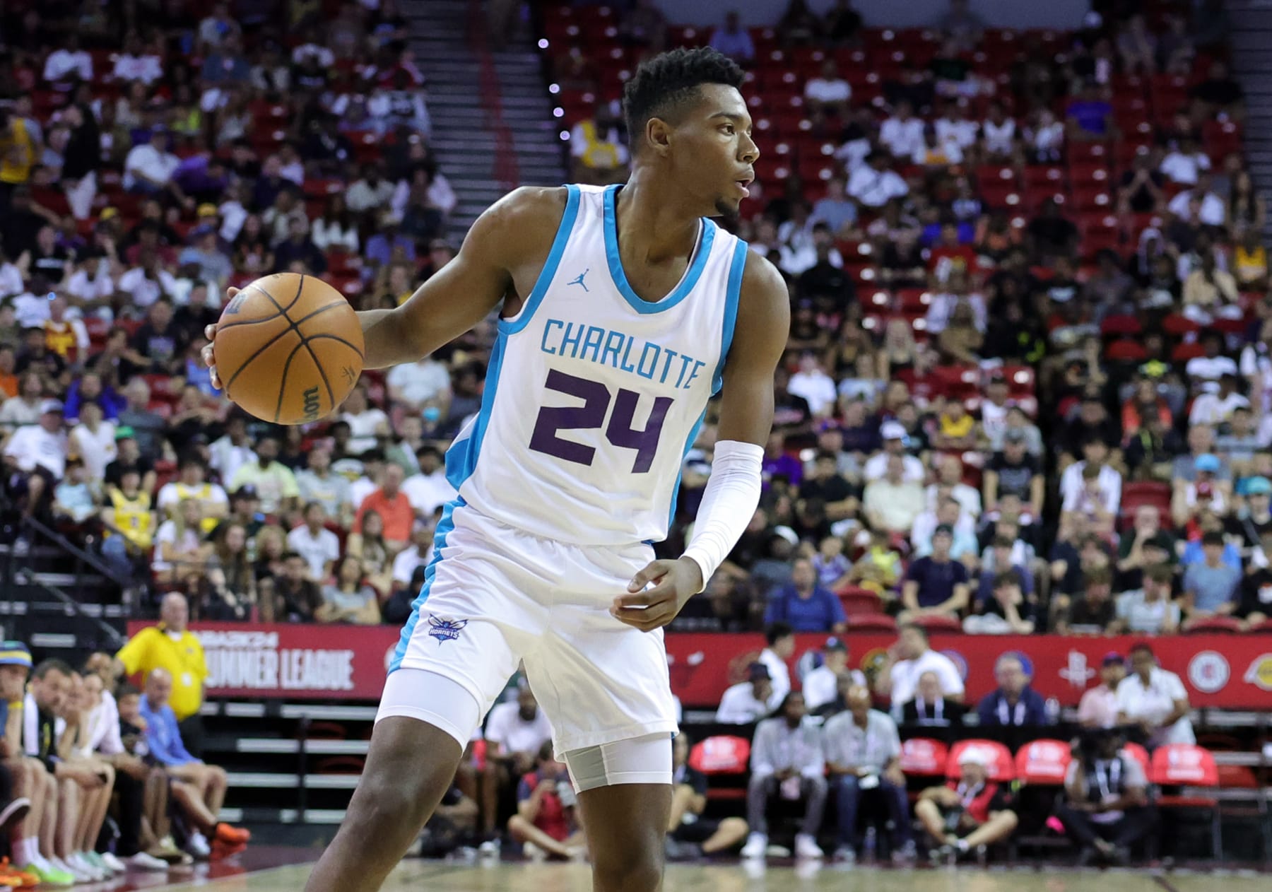 LAS VEGAS, NEVADA - JULY 09: Brandon Miller #24 of the Charlotte Hornets handles the ball against the Los Angeles Lakers in the first half of a 2023 NBA Summer League game at the Thomas & Mack Center on July 09, 2023 in Las Vegas, Nevada. NOTE TO USER: User expressly acknowledges and agrees that, by downloading and or using this photograph, User is consenting to the terms and conditions of the Getty Images License Agreement. (Photo by Ethan Miller/Getty Images)