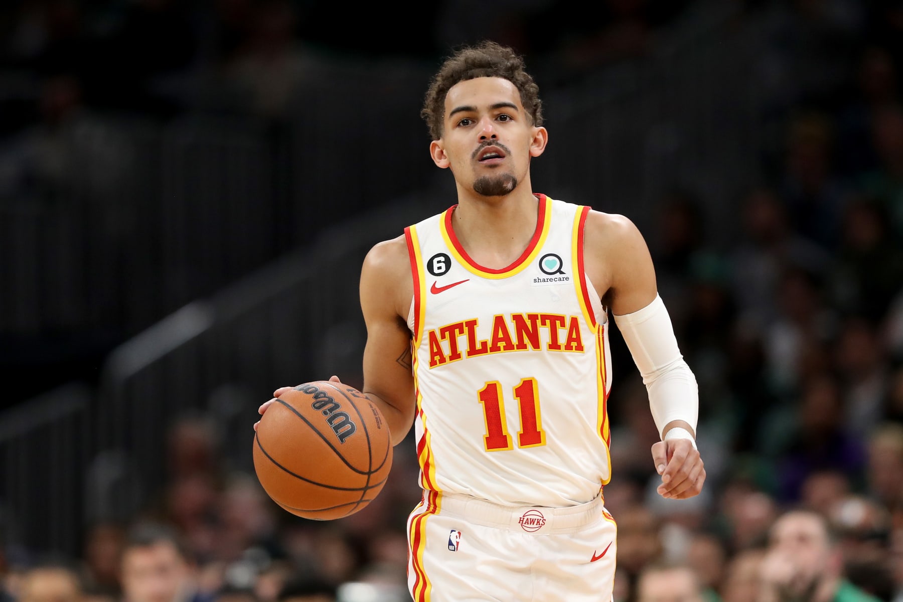 BOSTON, MASSACHUSETTS - APRIL 25: Trae Young #11 of the Atlanta Hawks dribbles against the Boston Celtics during the first quarter in game five of the Eastern Conference First Round Playoffs at TD Garden on April 25, 2023 in Boston, Massachusetts. NOTE TO USER: User expressly acknowledges and agrees that, by downloading and or using this photograph, User is consenting to the terms and conditions of the Getty Images License Agreement. (Photo by Maddie Meyer/Getty Images)