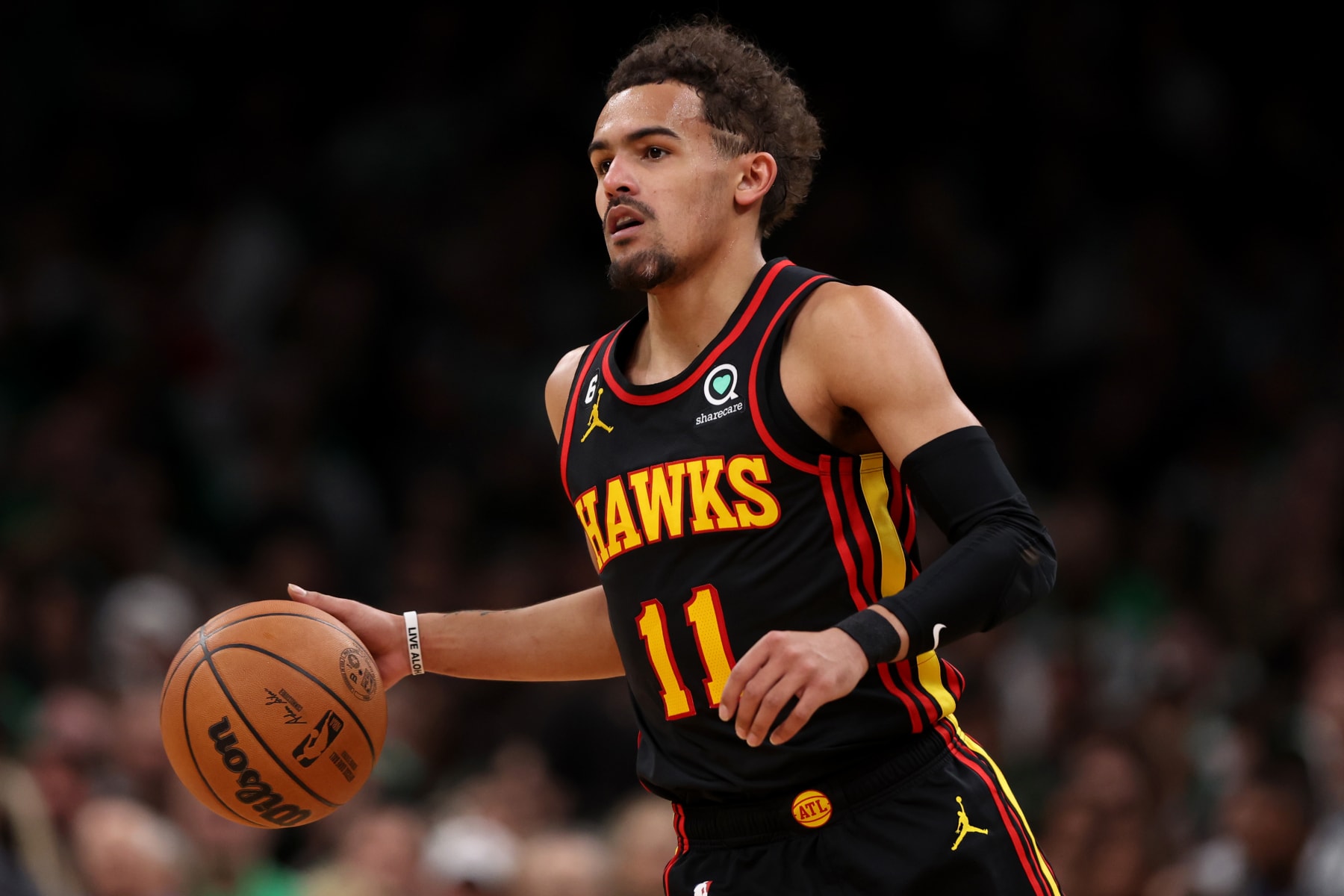 BOSTON, MASSACHUSETTS - APRIL 18: Trae Young #11 of the Atlanta Hawks dribbles down court during the second quarter of Game Two of the Eastern Conference First Round Playoffs between the Boston Celtics and the Atlanta Hawks at TD Garden on April 18, 2023 in Boston, Massachusetts. NOTE TO USER: User expressly acknowledges and agrees that, by downloading and or using this photograph, User is consenting to the terms and conditions of the Getty Images License Agreement.  (Photo by Maddie Meyer/Getty Images)