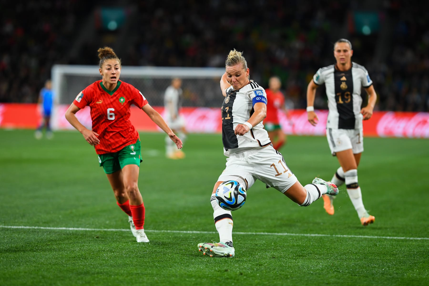 MELBOURNE, AUSTRALIA - 2023/07/24: Élodie Nakkach of Morocco and Alexandra Popp of Germany are seen in action during the FIFA Women's World Cup 2023 match between Germany and Morocco at the Melbourne Rectangular Stadium. 
Final score Germany 6:0 Morocco. (Photo by Alexander Bogatyrev/SOPA Images/LightRocket via Getty Images)