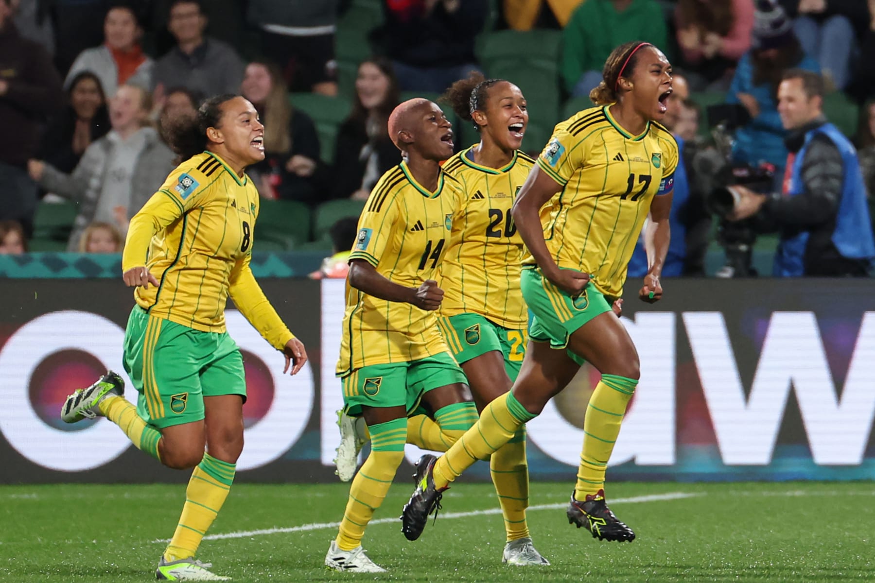 Jamaica's defender #17 Allyson Swaby (R) celebrates scoring her team's first goal during the Australia and New Zealand 2023 Women's World Cup Group F football match between Panama and Jamaica at Perth Rectangular Stadium in Perth on July 29, 2023. (Photo by Colin MURTY / AFP) (Photo by COLIN MURTY/AFP via Getty Images)