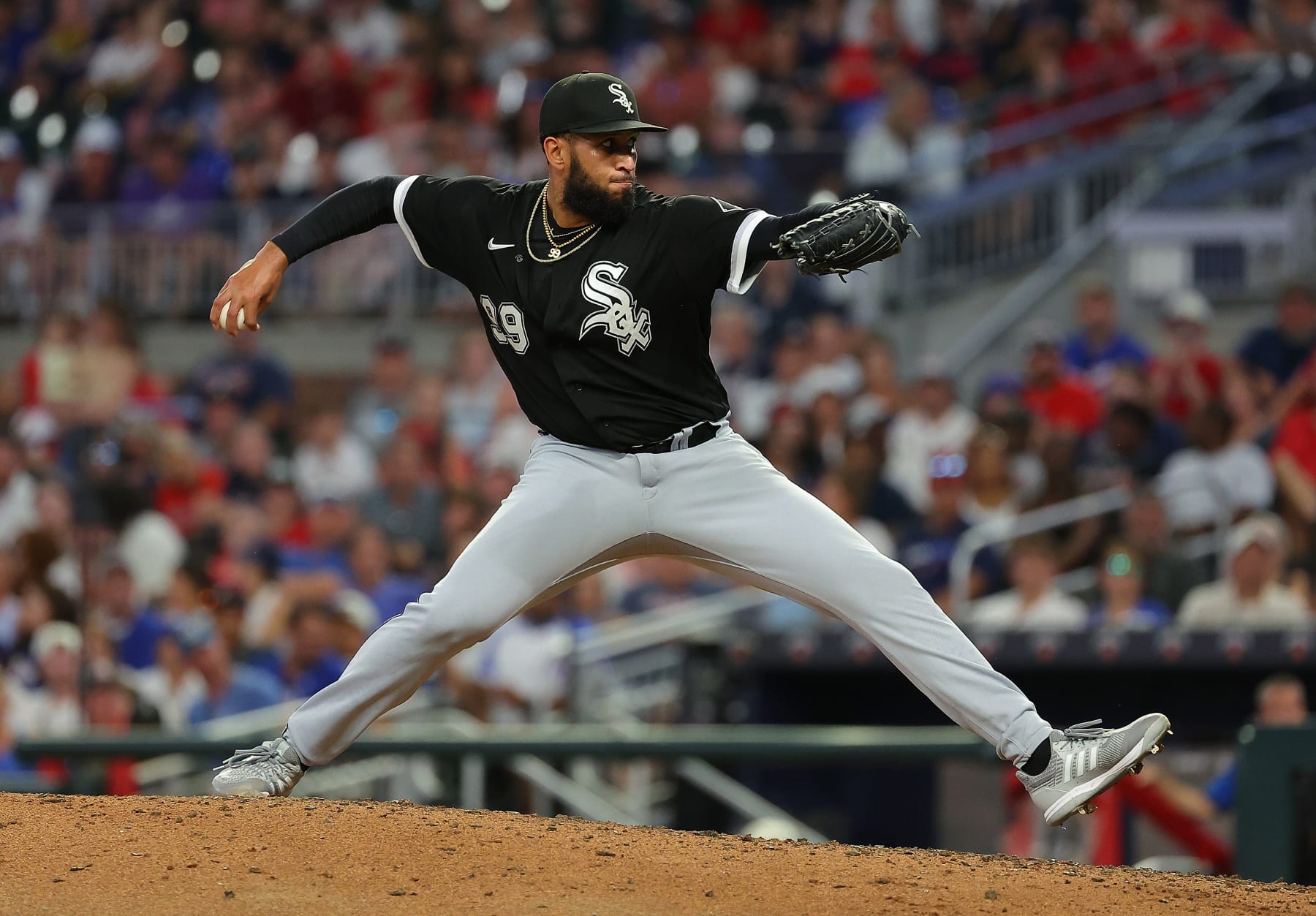 ATLANTA, GEORGIA - JULY 15:  Keynan Middleton #99 of the Chicago White Sox pitches in the eighth inning against the Atlanta Braves at Truist Park on July 15, 2023 in Atlanta, Georgia. (Photo by Kevin C. Cox/Getty Images)