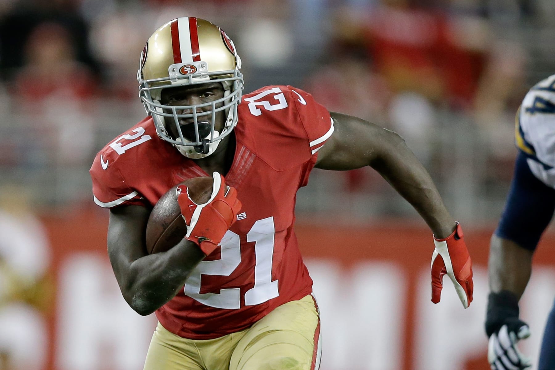 SANTA CLARA, CA - DECEMBER 20:  Running back Frank Gore #21 of the San Francisco 49ers runs the ball in the first half against the San Diego Chargers at Levi's Stadium on December 20, 2014 in Santa Clara, California.  (Photo by Ezra Shaw/Getty Images)