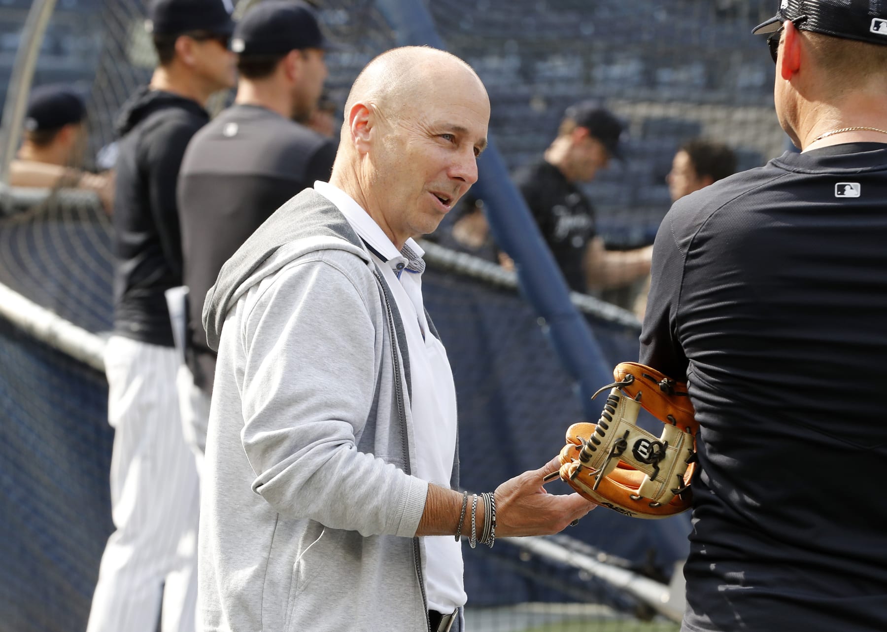 NEW YORK, NEW YORK - JUNE 20:  (NEW YORK DAILIES OUT)  New York Yankees general manager Brian Cashman looks on during batting practice before a game between the Yankees and the Seattle Mariners at Yankee Stadium on June 20, 2023 in the Bronx borough of New York City. The Yankees defeated the Mariners 3-1. (Photo by Jim McIsaac/Getty Images)