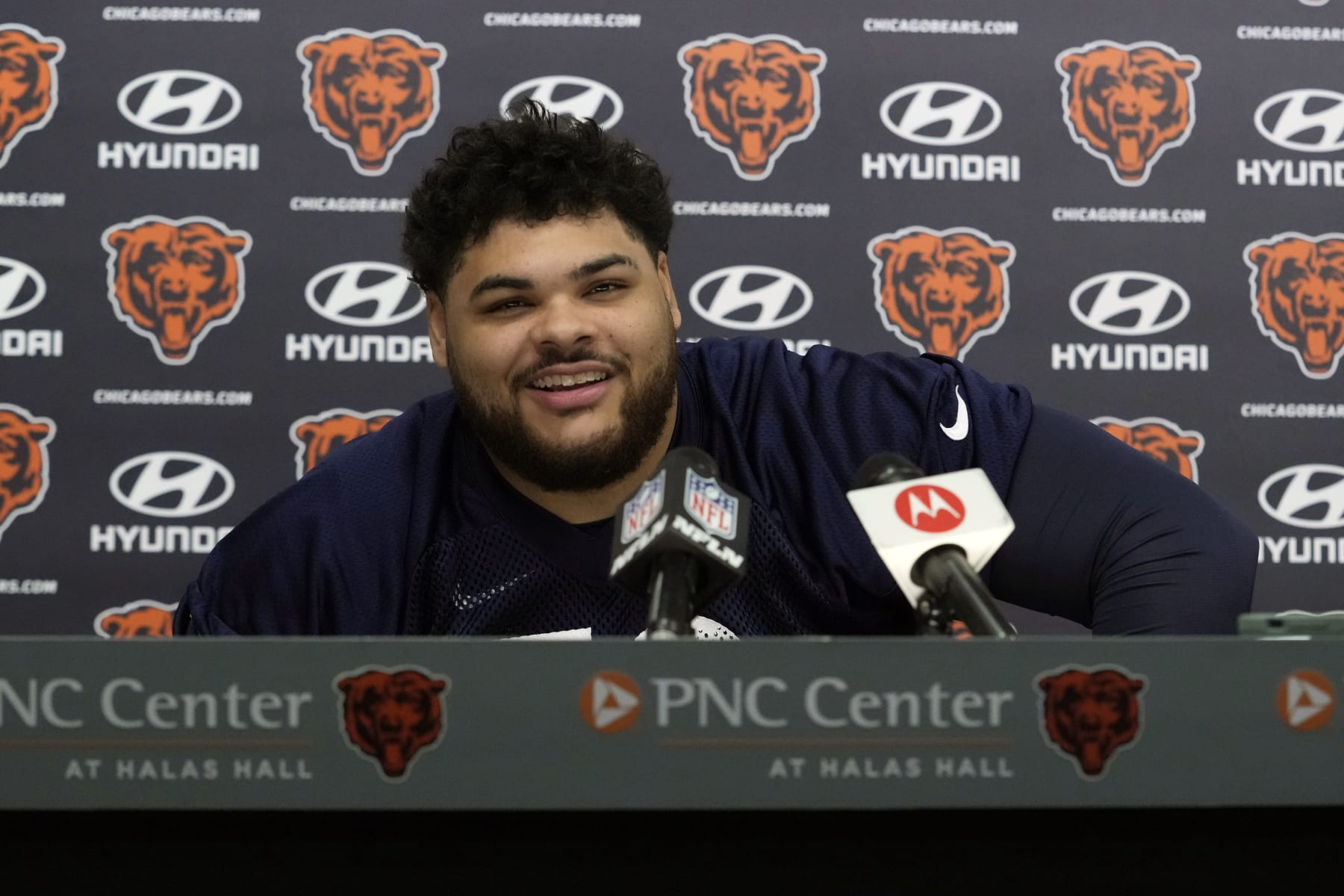 Chicago Bears offensive line Darnell Wright, picked 10th overall at the 2023 NFL Draft, smiles as he listens to a question from the media at a news conference during the NFL football team's rookie minicamp at Halas Hall in Lake Forest, Ill., Friday, May 5, 2023. (AP Photo/Nam Y. Huh)