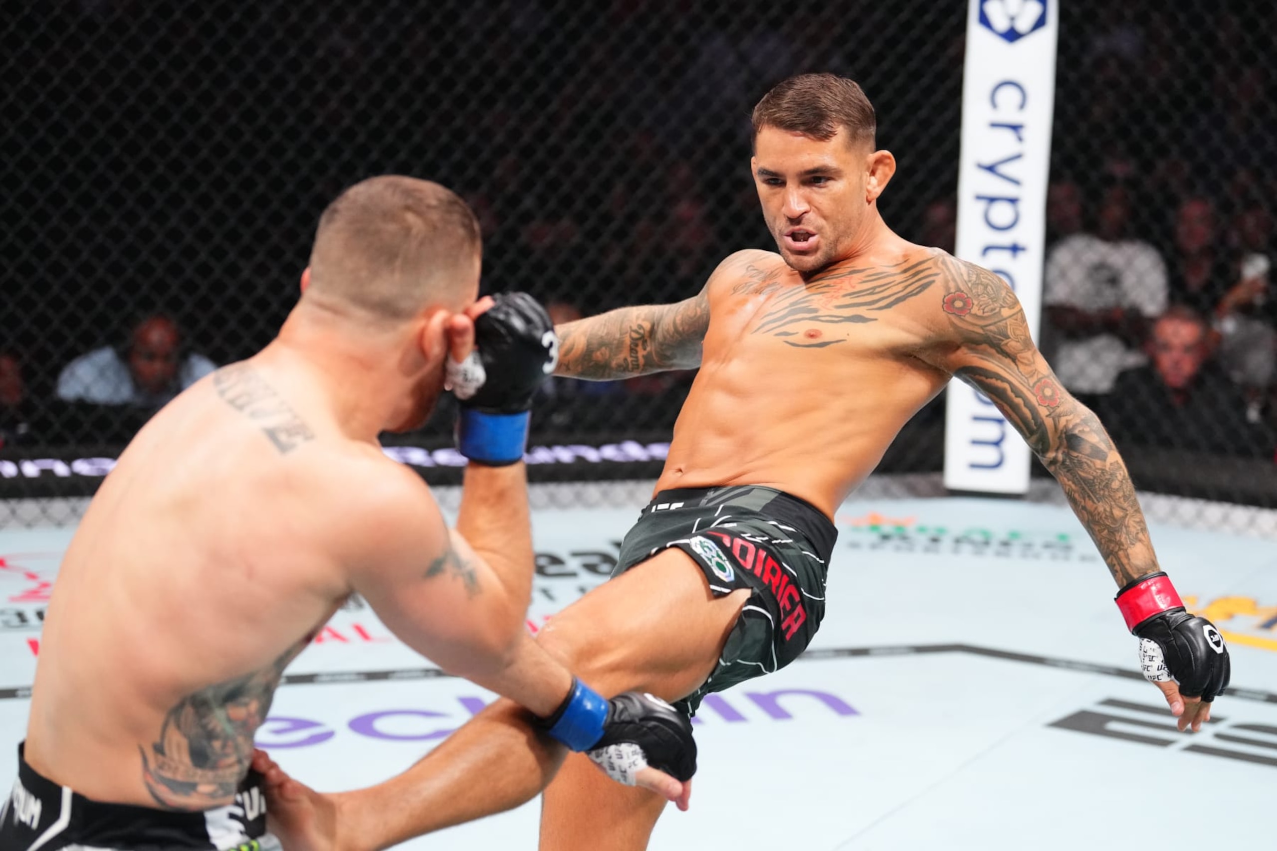 SALT LAKE CITY, UTAH - JULY 29: (R-L) Dustin Poirier kicks Justin Gaethje in a lightweight fight for the BMF belt during the UFC 291 event at Delta Center on July 29, 2023 in Salt Lake City, Utah. (Photo by Josh Hedges/Zuffa LLC via Getty Images)