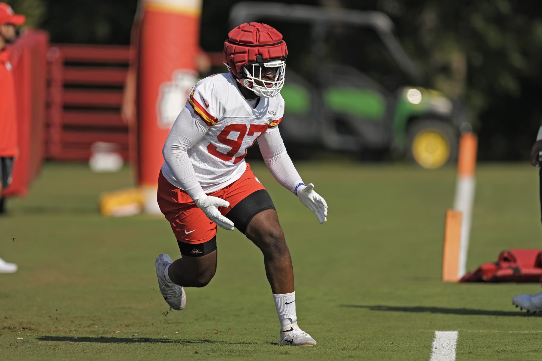 Kansas City Chiefs defensive end Felix Anudike-Uzomah runs a drill at NFL football training camp Sunday, July 23, 2023, in St. Joseph, Mo. (AP Photo/Charlie Riedel)
