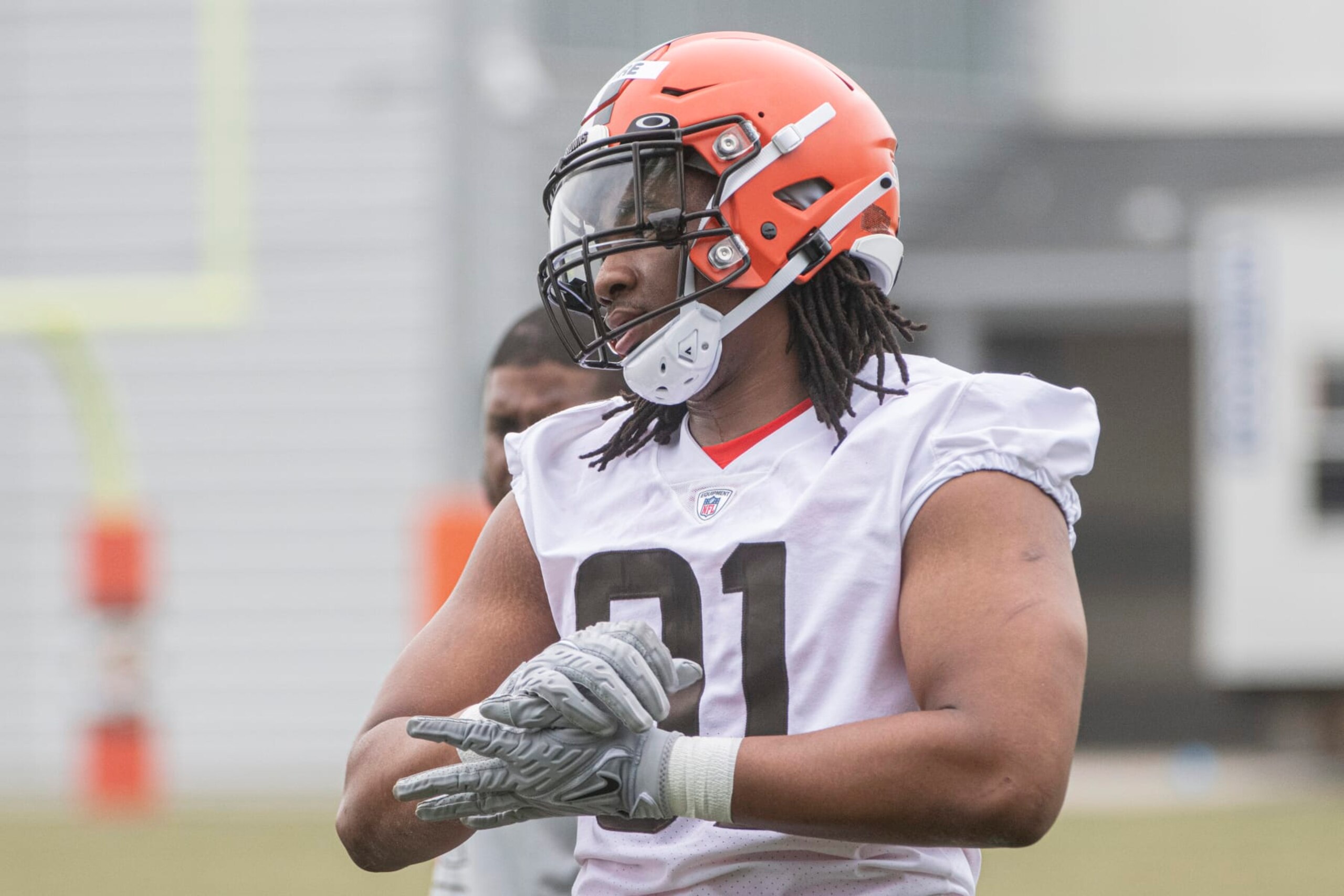 Cleveland Browns rookie Isaiah McGuire prepares to perform a drill at the NFL football team's rookie minicamp in Berea, Ohio, Saturday, May 13, 2023. (AP Photo/Phil Long)