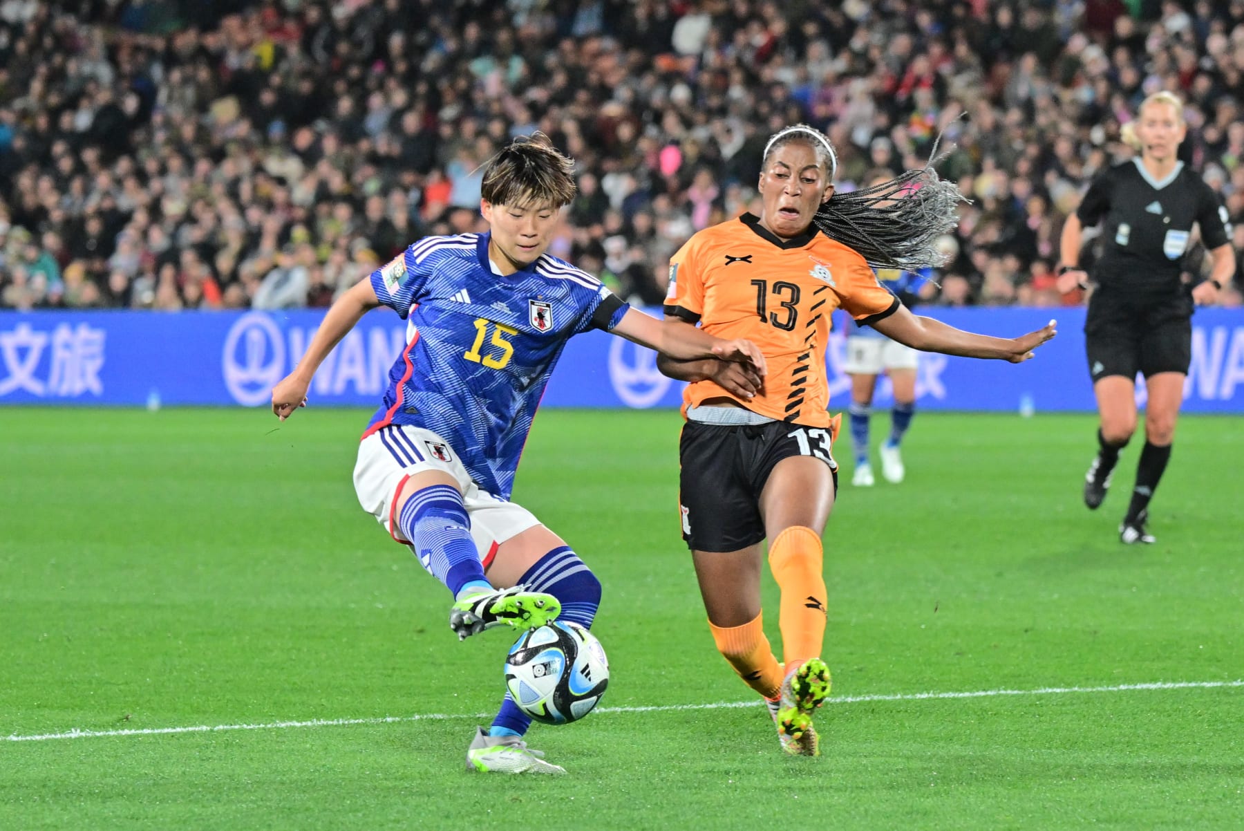 Fujino Aoba L of Japan vies with Martha Tembo of Zambia during their group C match at the FIFA Women's World Cup in Hamilton, New Zealand, July 22, 2023. (Photo by Zhu Wei/Xinhua via Getty Images)