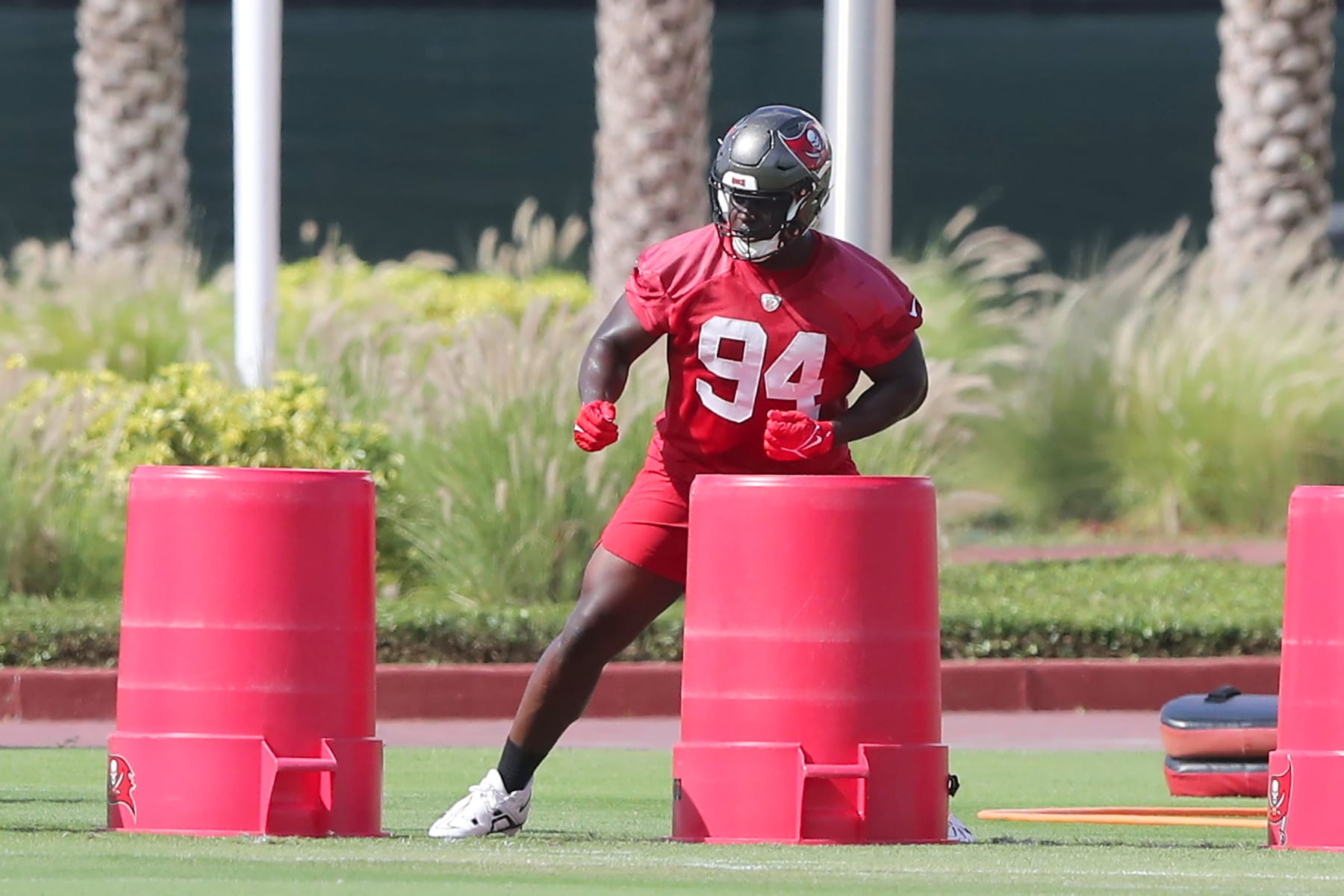 TAMPA, FL - JUN 14: Tampa Bay Buccaneers Defensive Lineman Calijah Kancey (94) goes thru a drill during the Tampa Bay Buccaneers Minicamp on June 14, 2023 at the AdventHealth Training Center at One Buccaneer Place in Tampa, Florida. (Photo by Cliff Welch/Icon Sportswire via Getty Images)