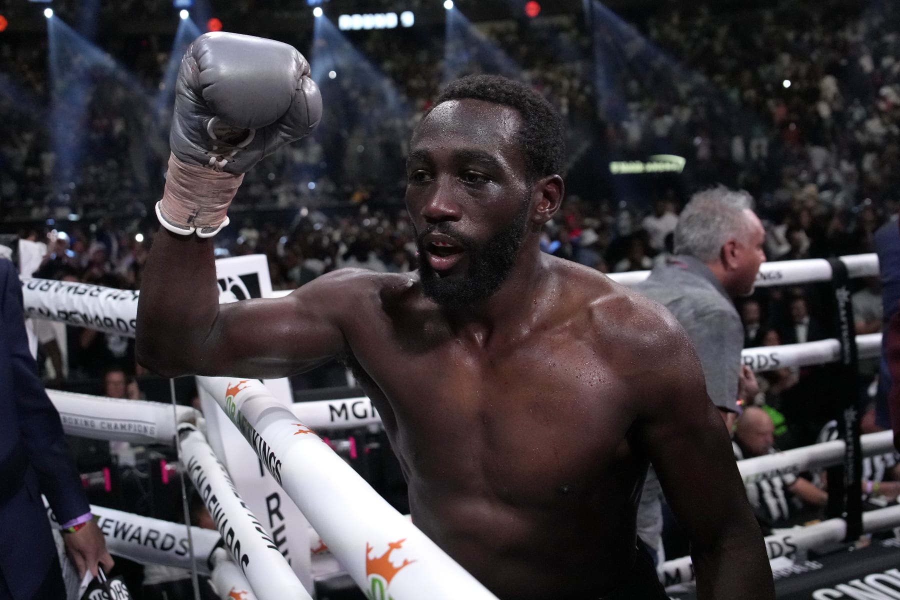 Terence Crawford celebrates his undisputed welterweight championship boxing match win over Errol Spence Jr., Saturday, July 29, 2023, in Las Vegas. (AP Photo/John Locher)