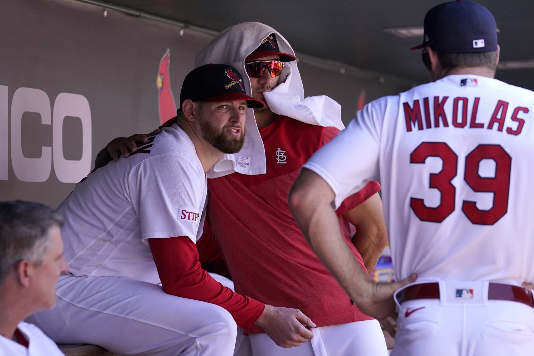 St. Louis Cardinals starting pitcher Jordan Montgomery, left, gets a hug from teammate Jack Flaherty as Miles Mikolas (39) watches after being removed during the seventh inning of a baseball game against the New York Yankees Sunday, July 2, 2023, in St. Louis. (AP Photo/Jeff Roberson) St. Louis Cardinals starting pitcher Jordan Montgomery, left, gets a hug from teammate Jack Flaherty as Miles Mikolas (39) watches after being removed during the seventh inning of a baseball game against the New York Yankees Sunday, July 2, 2023, in St. Louis. (AP Photo/Jeff Roberson)