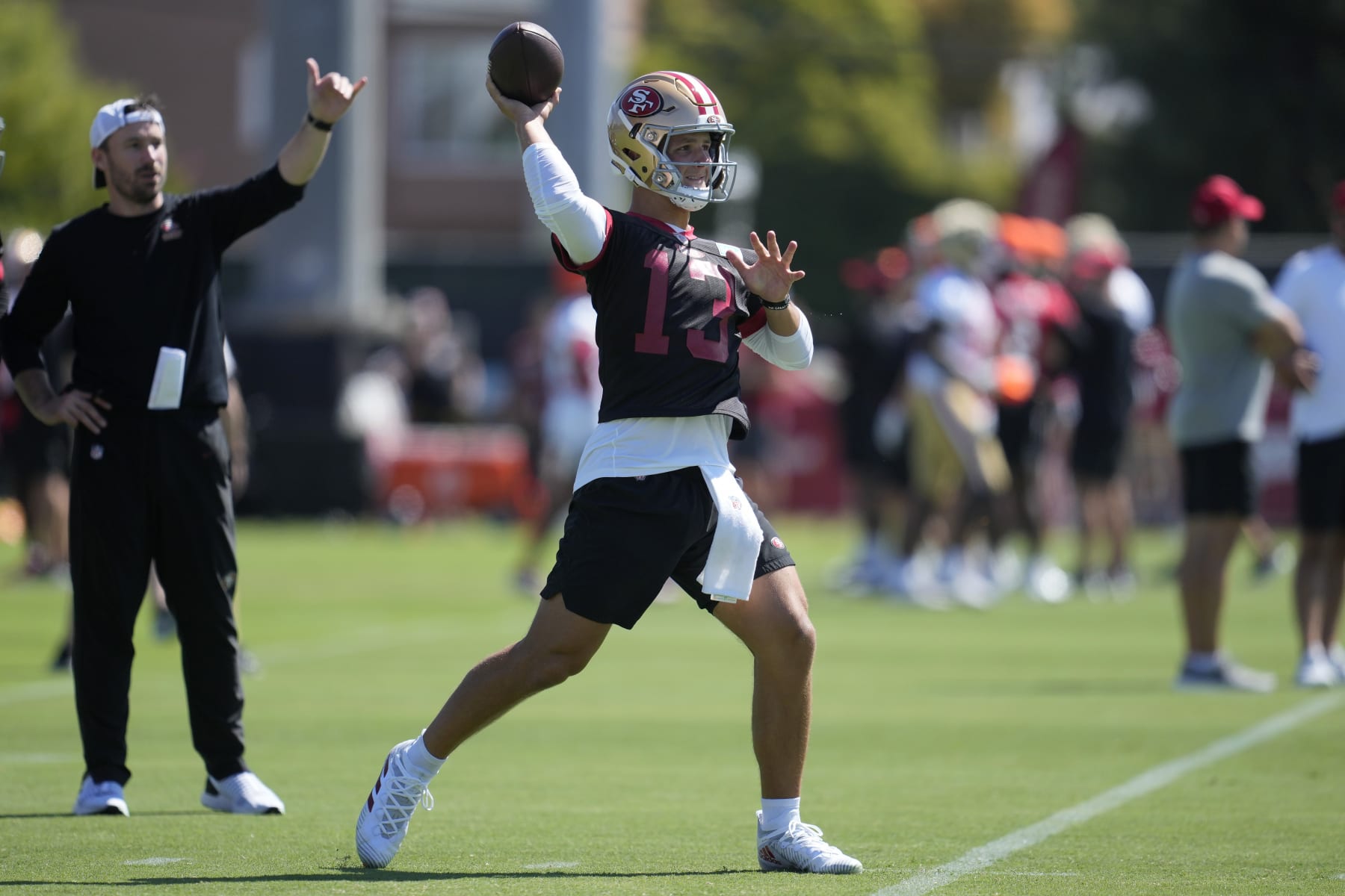 San Francisco 49ers quarterback Brock Purdy passes during the NFL team's football training camp in Santa Clara, Calif., Thursday, July 27, 2023. (AP Photo/Jeff Chiu)