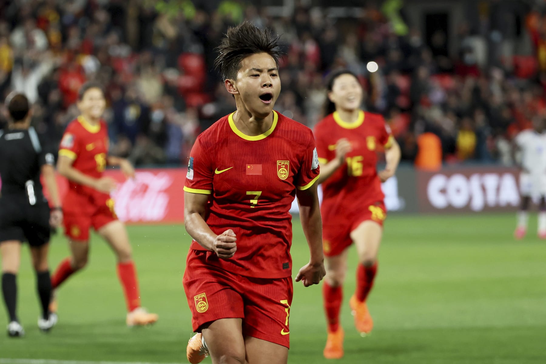 China's Wang Shuang, center, celebrates after scoring the opening goal from the penalty spot during the Women's World Cup Group D soccer match between China and Haiti in Adelaide, Australia, Friday, July 28, 2023. (AP Photo/James Elsby)
