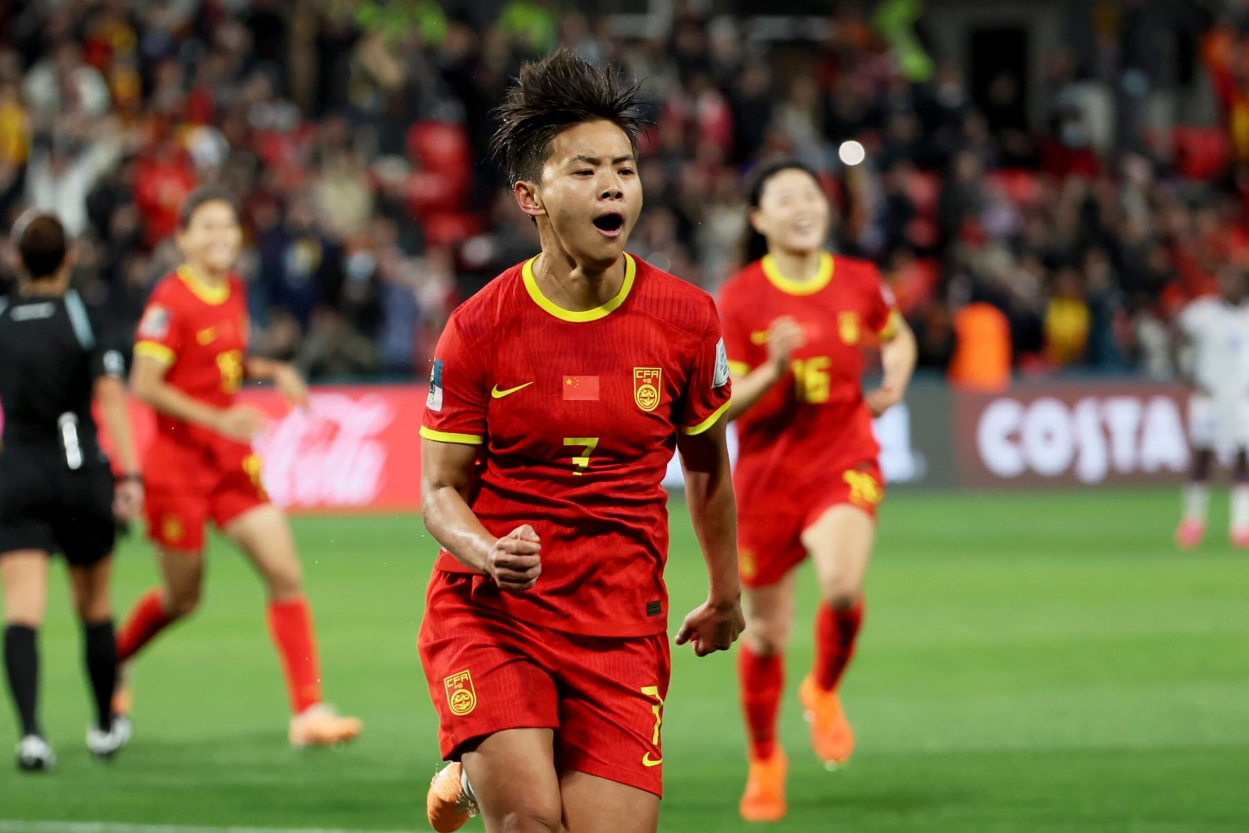 China's Wang Shuang, center, celebrates after scoring the opening goal from the penalty spot during the Women's World Cup Group D soccer match between China and Haiti in Adelaide, Australia, Friday, July 28, 2023. (AP Photo/James Elsby)
