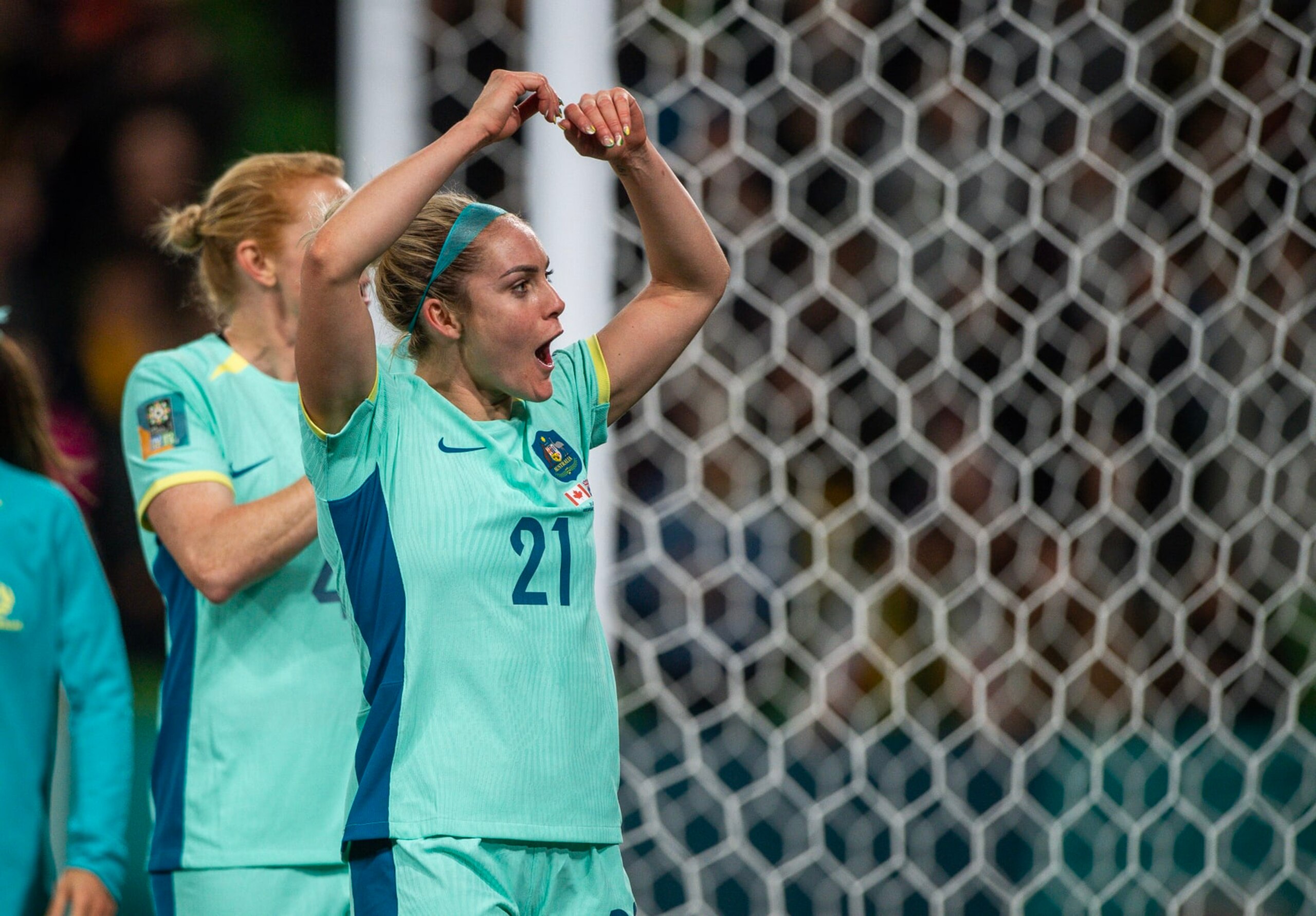 MELBOURNE, AUSTRALIA - JULY 31: Ellie Carpenter of Australia celebrates at the end of the FIFA Women's World Cup Australia & New Zealand 2023 Group B match between Canada and Australia at Melbourne Rectangular Stadium on July 31, 2023 in Melbourne, Australia. (Photo by Will Murray/Getty Images)