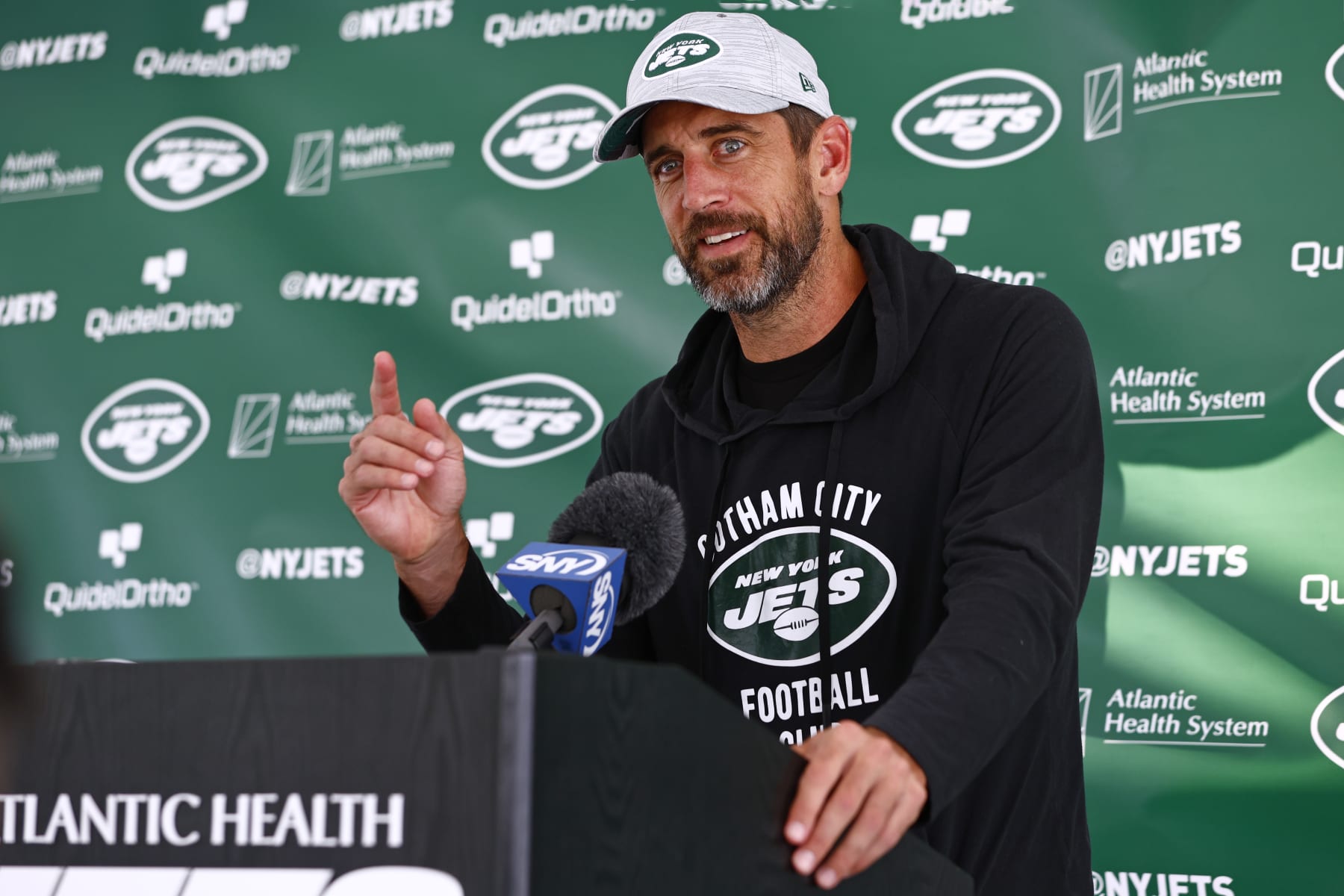 FLORHAM PARK, NEW JERSEY - JULY 26: Quarterback Aaron Rodgers #8 of the New York Jets talks to reporters after training camp at Atlantic Health Jets Training Center on July 26, 2023 in Florham Park, New Jersey. (Photo by Rich Schultz/Getty Images)