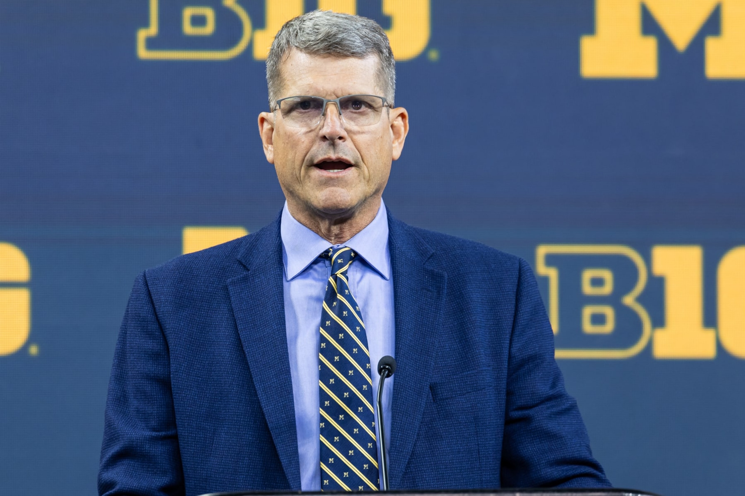 INDIANAPOLIS, INDIANA - JULY 27: Head coach Jim Harbaugh of the Michigan Wolverines speaks at Big Ten football media days at Lucas Oil Stadium on July 27, 2023 in Indianapolis, Indiana. (Photo by Michael Hickey/Getty Images) INDIANAPOLIS, INDIANA - JULY 27: Head coach Jim Harbaugh of the Michigan Wolverines speaks at Big Ten football media days at Lucas Oil Stadium on July 27, 2023 in Indianapolis, Indiana. (Photo by Michael Hickey/Getty Images)