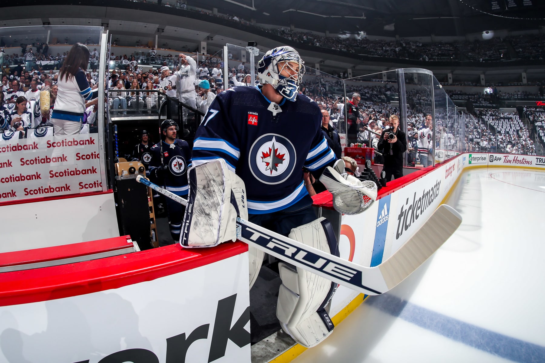 WINNIPEG, CANADA - APRIL 24: Goaltender Connor Hellebuyck #37 of the Winnipeg Jets hits the ice for the start of the pre-game warm up prior to NHL action against the Vegas Golden Knights in Game Four of the First Round of the 2023 Stanley Cup Playoffs at the Canada Life Centre on April 24, 2023 in Winnipeg, Manitoba, Canada. (Photo by Darcy Finley/NHLI via Getty Images)