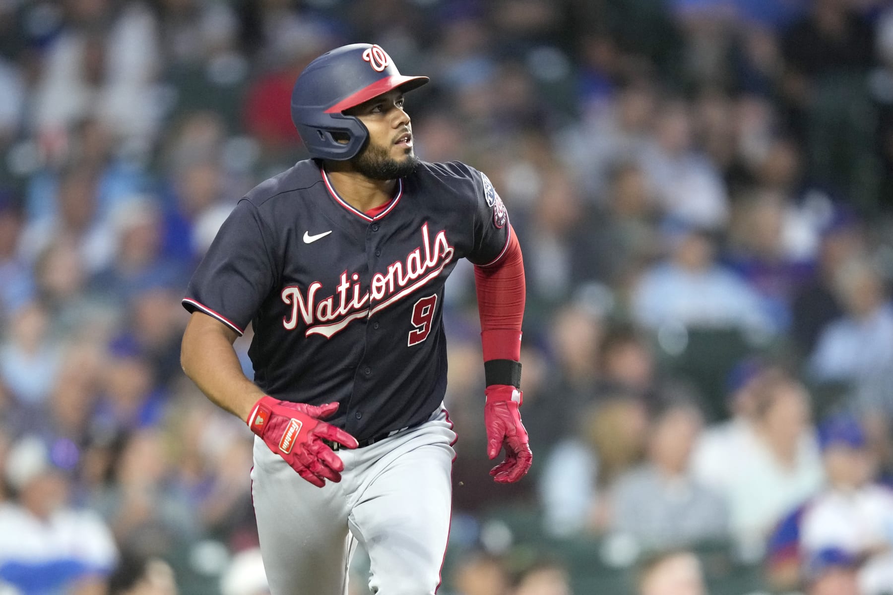 Washington Nationals' Jeimer Candelario watches his fly out in a baseball game against the Chicago Cubs Tuesday, July 18, 2023, in Chicago. (AP Photo/Charles Rex Arbogast)