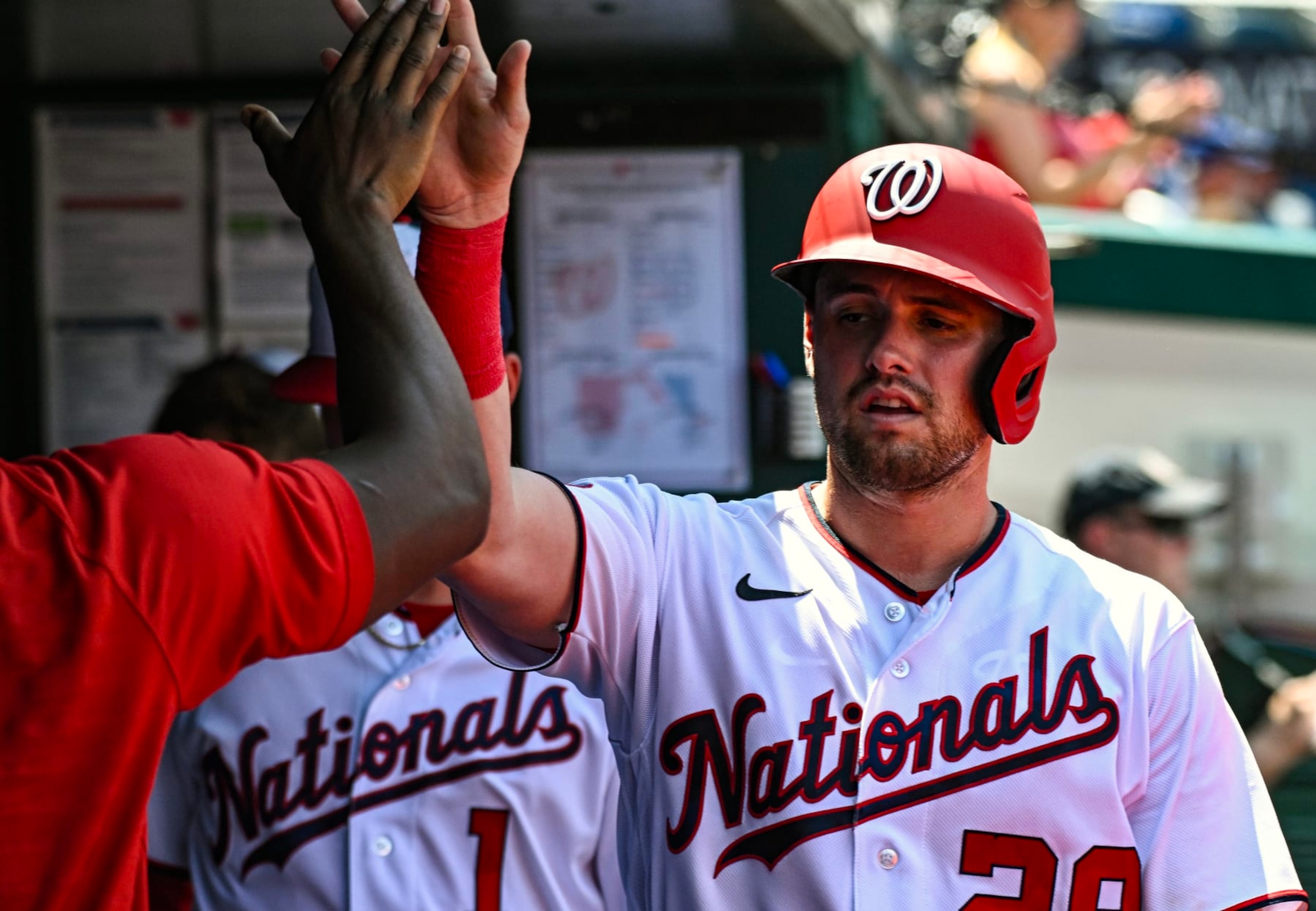 WASHINGTON, DC - July 23: Washington Nationals right fielder Lane Thomas (28) is congratulated in the dugout after scoring during the San Fransisco Giants versus the Washington Nationals on July 23, 2023 at Nationals Park in Washington, D.C. (Photo by Mark Goldman/Icon Sportswire via Getty Images) WASHINGTON, DC - July 23: Washington Nationals right fielder Lane Thomas (28) is congratulated in the dugout after scoring during the San Fransisco Giants versus the Washington Nationals on July 23, 2023 at Nationals Park in Washington, D.C. (Photo by Mark Goldman/Icon Sportswire via Getty Images)
