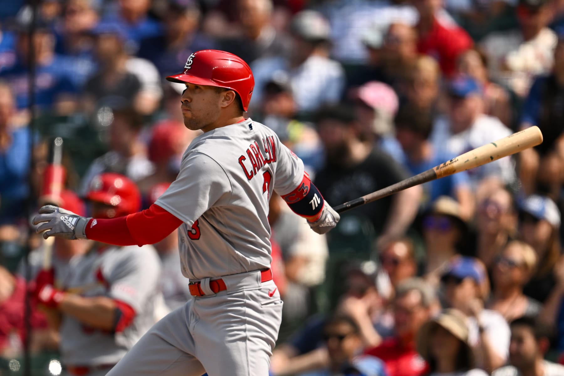 CHICAGO, ILLINOIS - JULY 23: Dylan Carlson #3 of the St. Louis Cardinals hits a RBI single in the eighth inning against the Chicago Cubs at Wrigley Field on July 23, 2023 in Chicago, Illinois. (Photo by Quinn Harris/Getty Images)