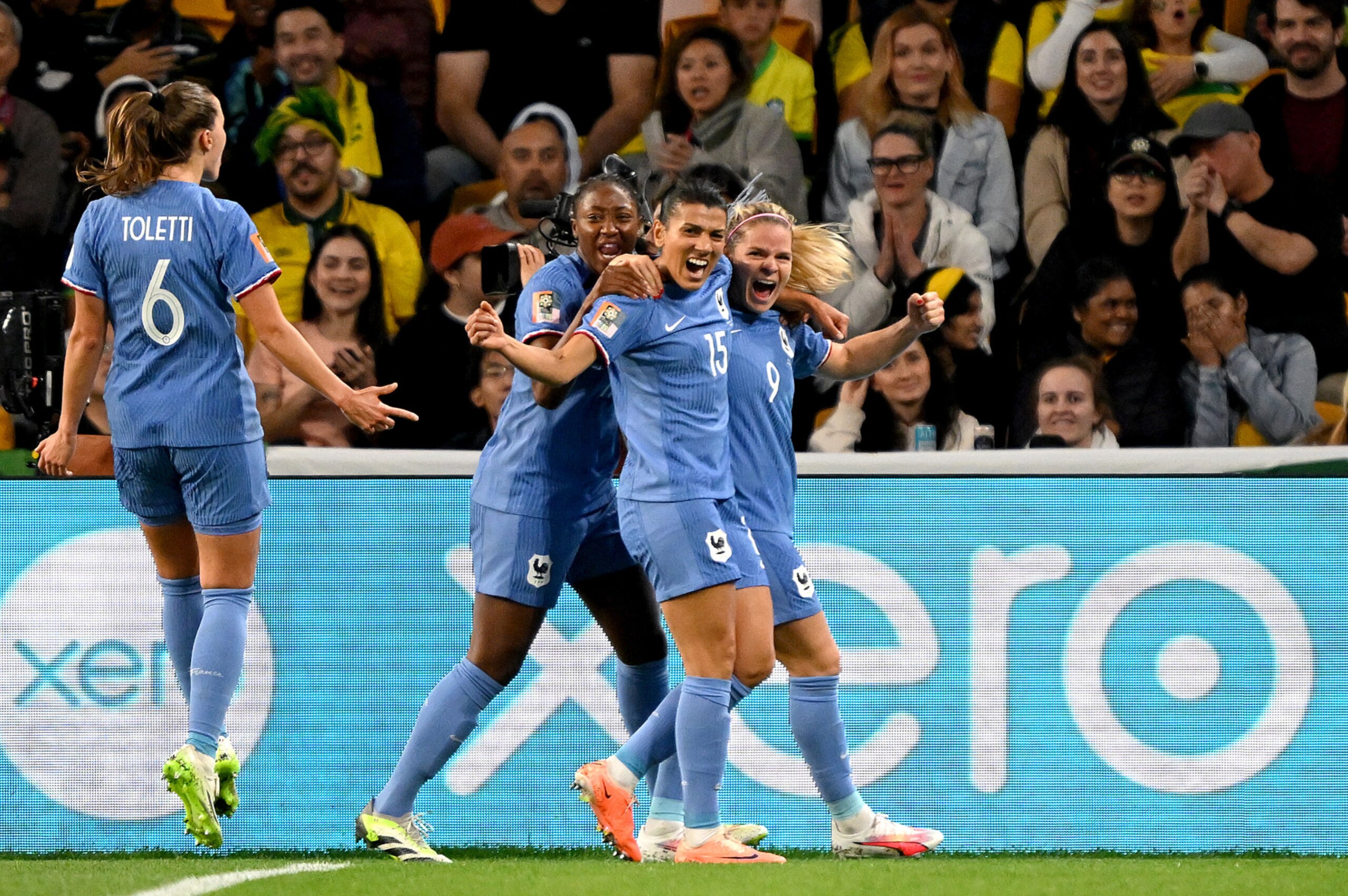 BRISBANE, AUSTRALIA - JULY 29:  Eugenie Le Sommer (R) of France celebrates with team mates after scoring her team's first goal during the FIFA Women's World Cup Australia & New Zealand 2023 Group F match between France and Brazil at Brisbane Stadium on July 29, 2023 in Brisbane, Australia. (Photo by Bradley Kanaris/Getty Images)